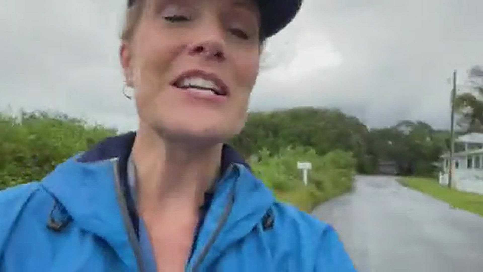 A St. Augustine woman is trying to prevent debris ruining her yard during flooding from Hurricane Ian.
Credit: Jessica Clark