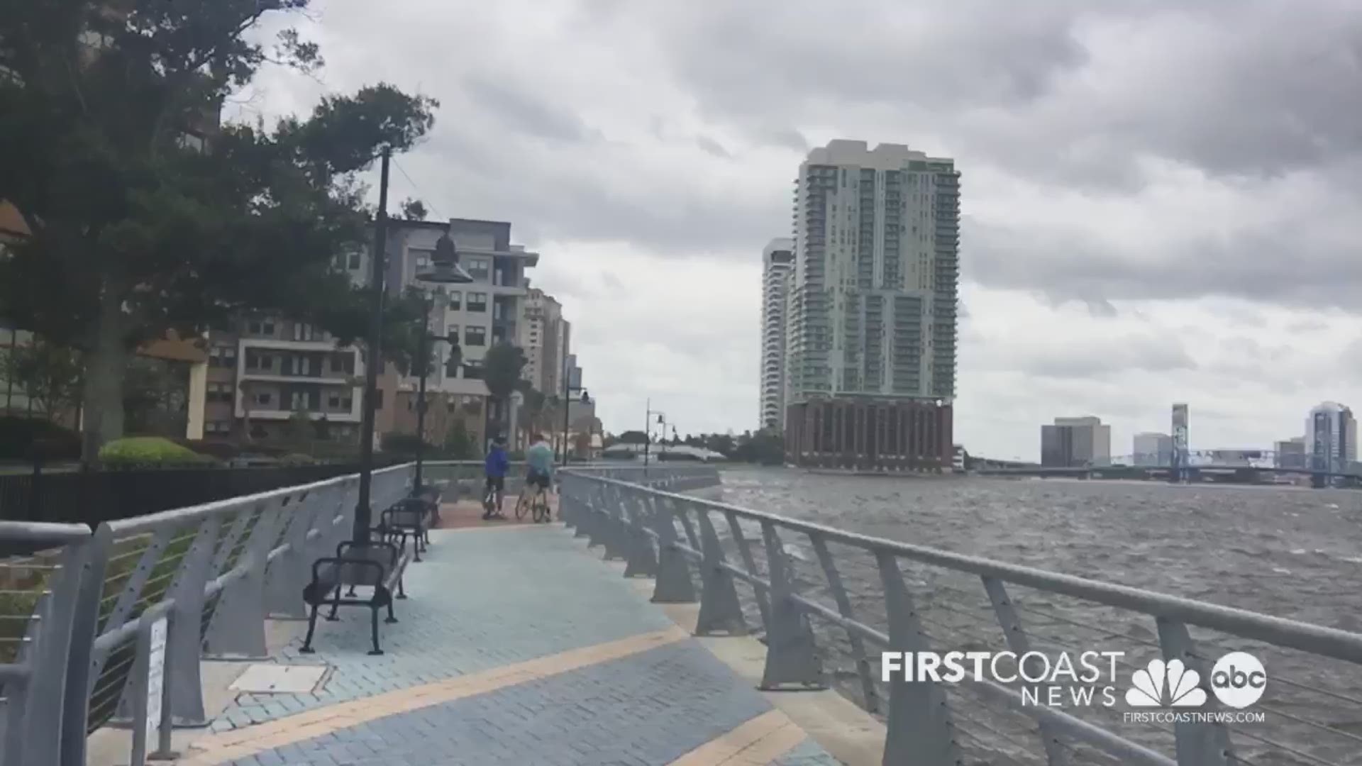 Mia O'Brien checks in from the bank of the St. Johns River where, as of 12:30 p.m., winds have picked up. At this time the bridges remain open in the area.