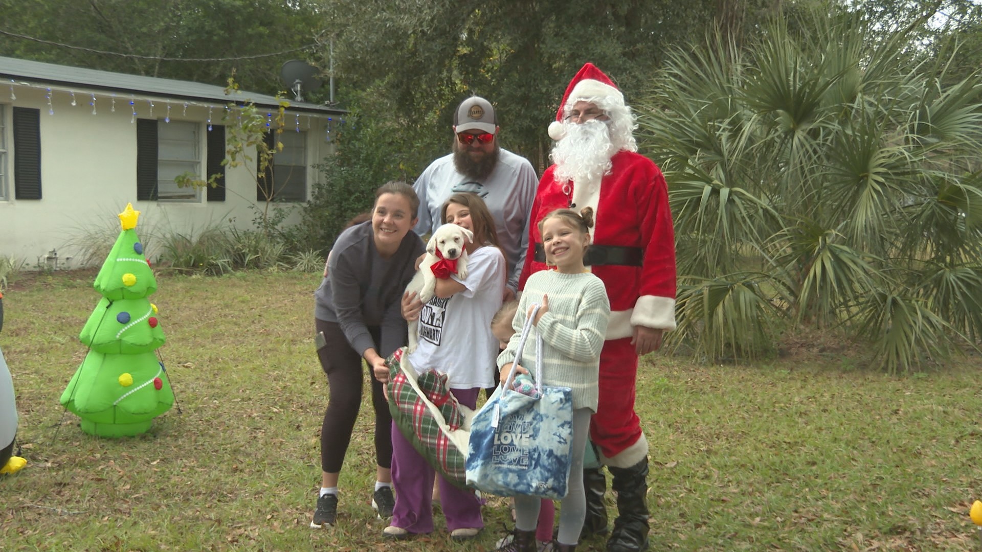 Delivered by Santa Clause himself, the 1-month-old puppy is more than just a Christmas gift.