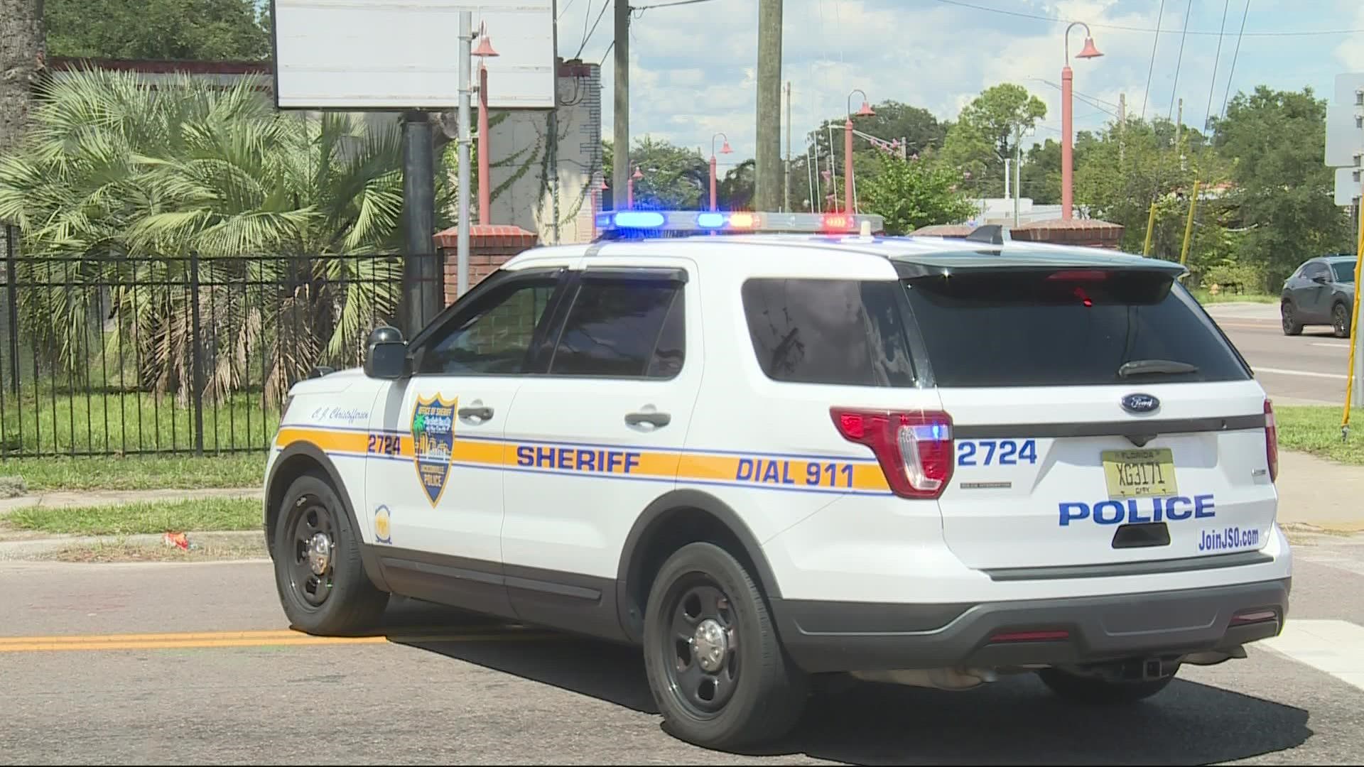 Officers found a man and woman who had been shot in a fenced backyard behind a home on West 27th Street.