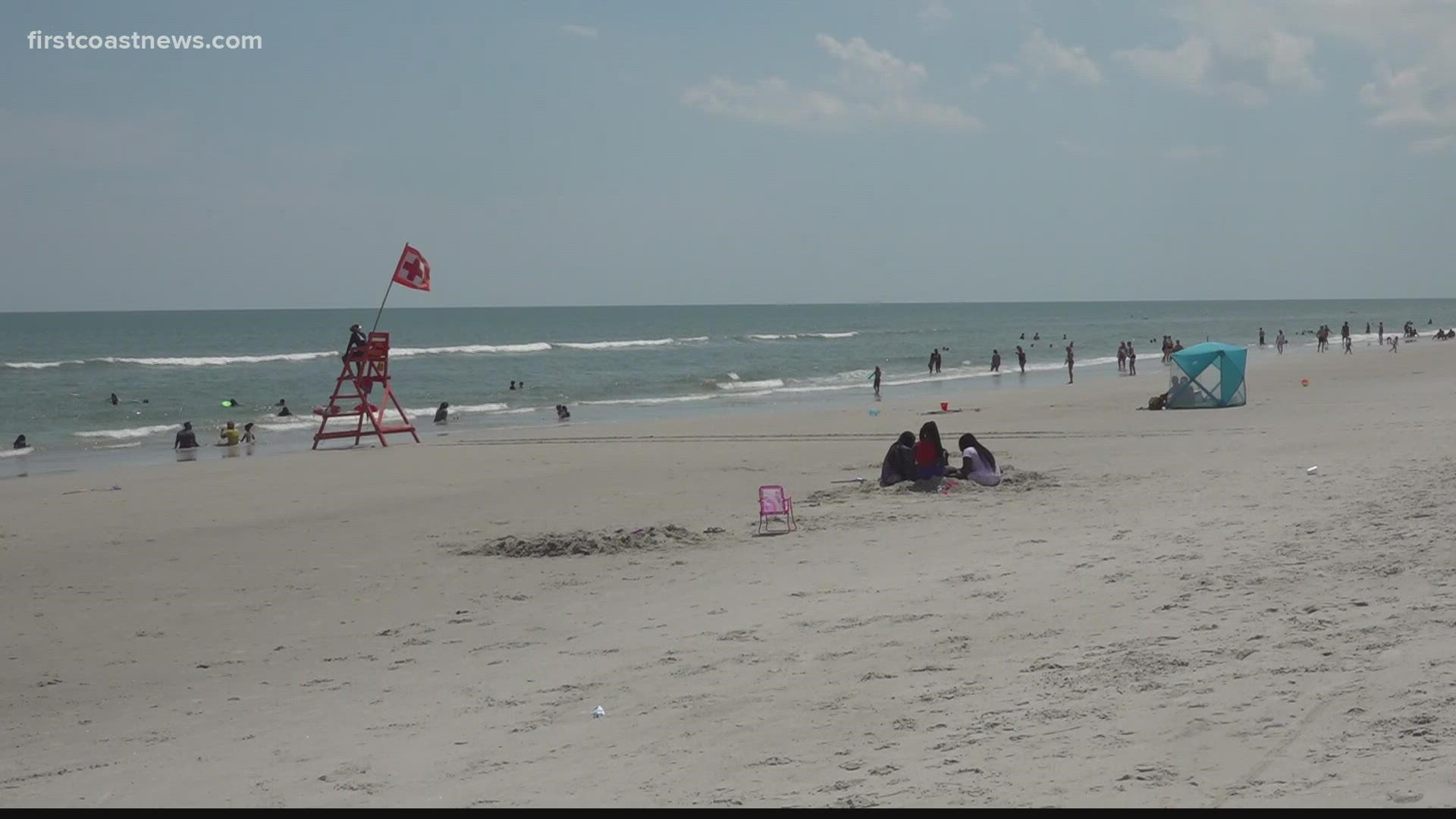While yellow flags flew above the beaches Sunday, lifeguards warned beachgoers to be on guard for dangerous conditions.