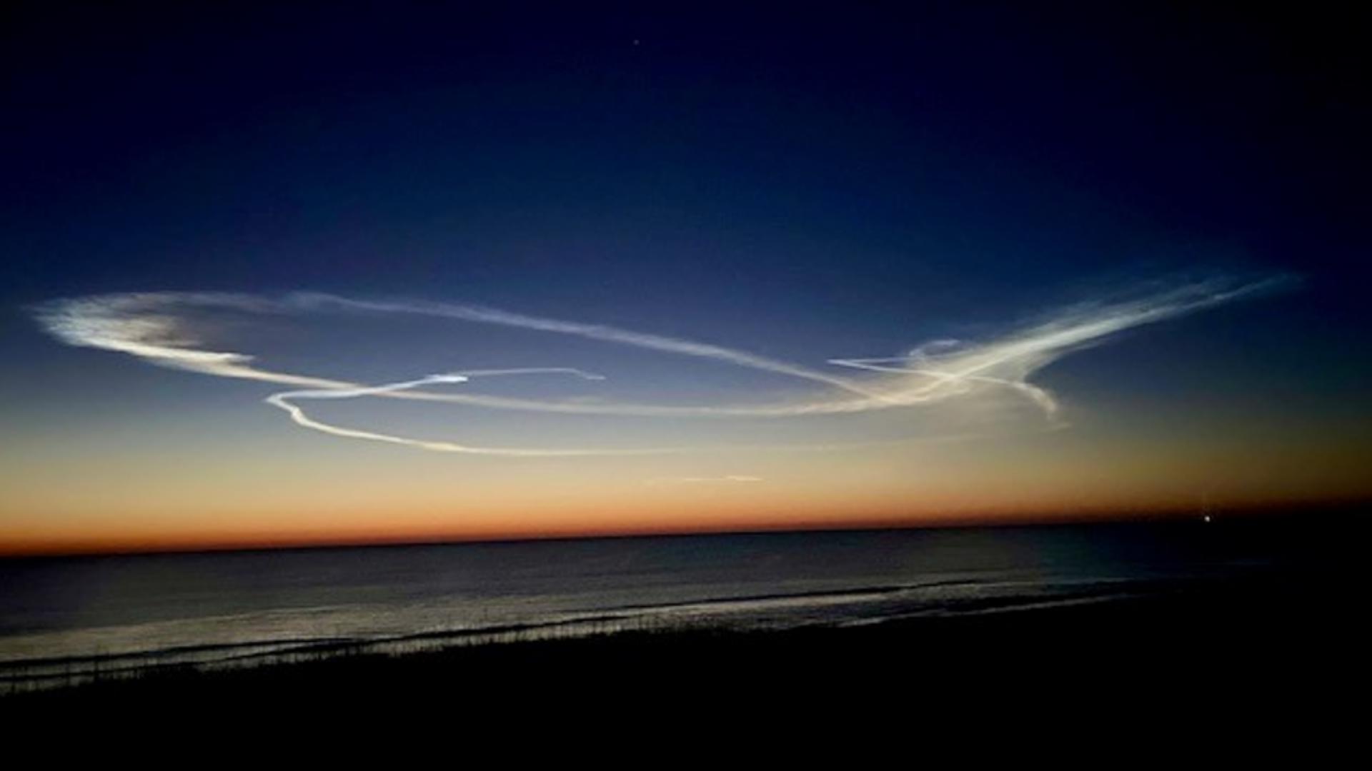 It looked like the clouds were written in cursive this morning just before sunrise, all thanks to another launch from the Space Coast.