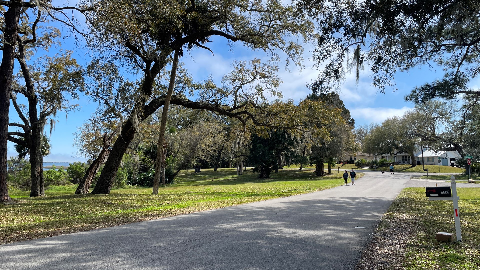 The trail would provide an ADA-accessible path for walkers and cyclists. Those who oppose it worry it will harm trees and increase erosion.