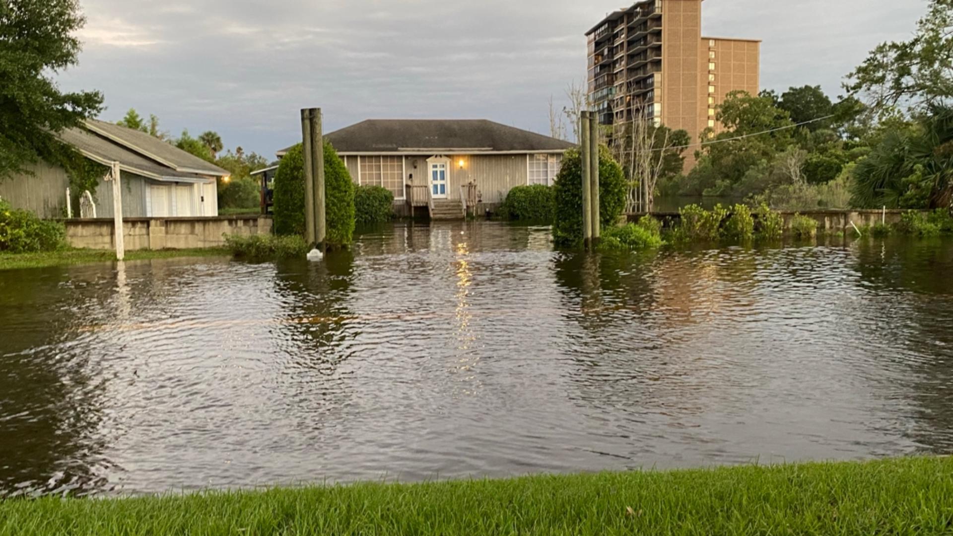 Front yards, garages and backyards were covered in water at houses in the Ortega neighborhood after Hurricane Milton swept through the state.