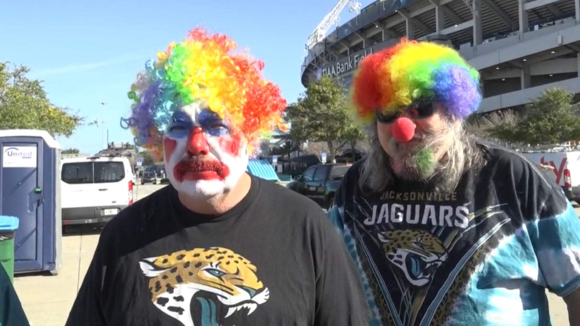 Jaguars fans show their displeasure with team management by dressing up as clowns before the final game of the season.