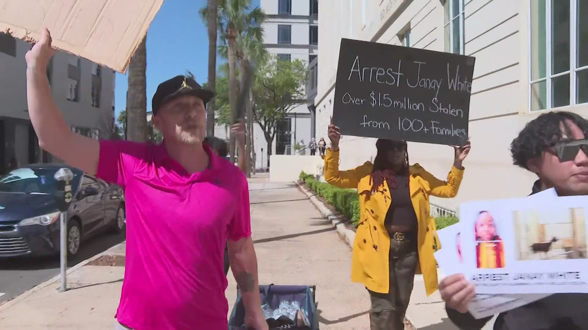 Four people who claim to be victims of real estate scams involving Janay White protested through downtown Jacksonville and called for White to be arrested.