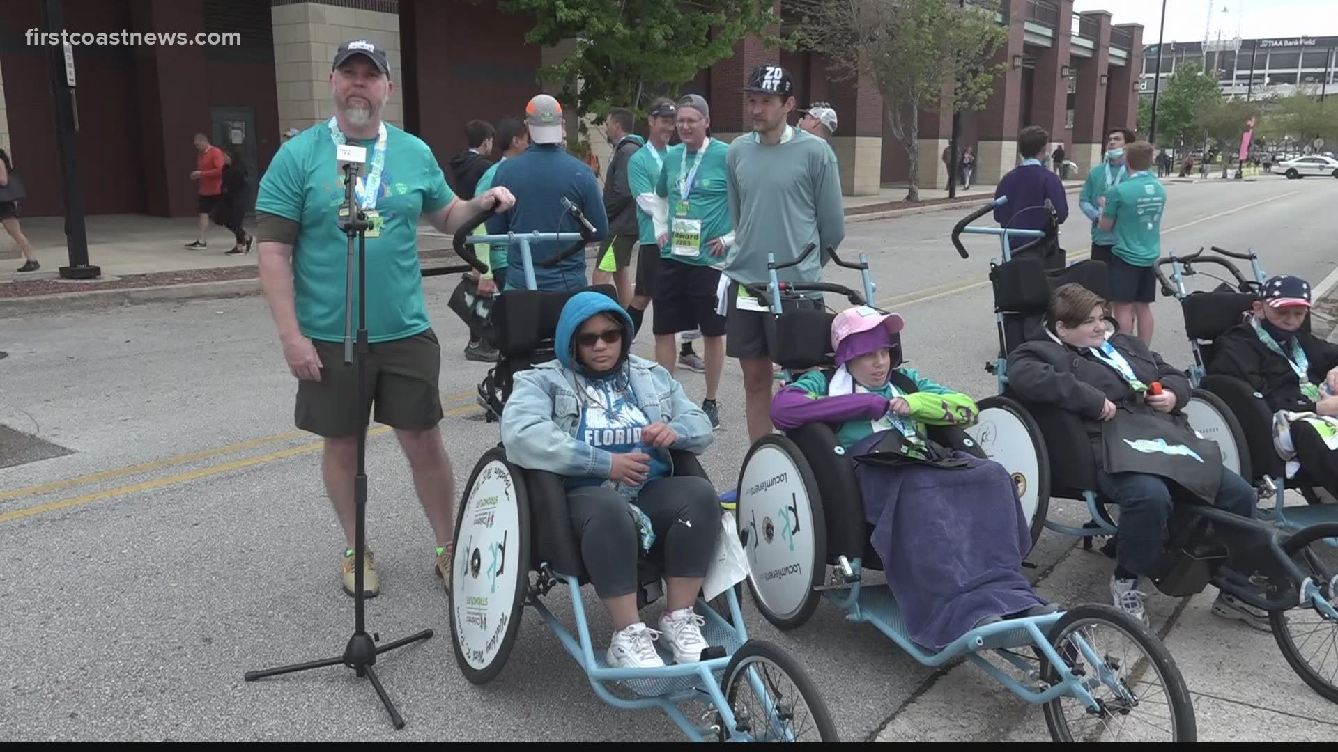 Athletes with and without disabilities team up for Gate River Run 15K