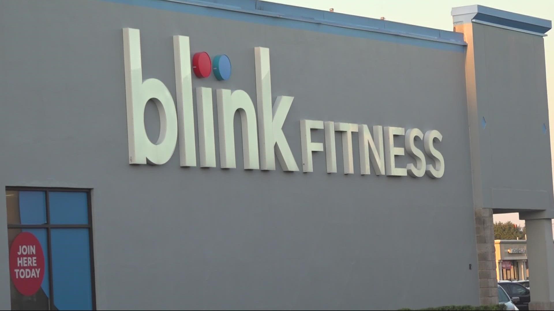 There's a sign on the door at Blink Fitness saying the gym is closed and they will communicate soon. Members say they have not been notified about the closure.