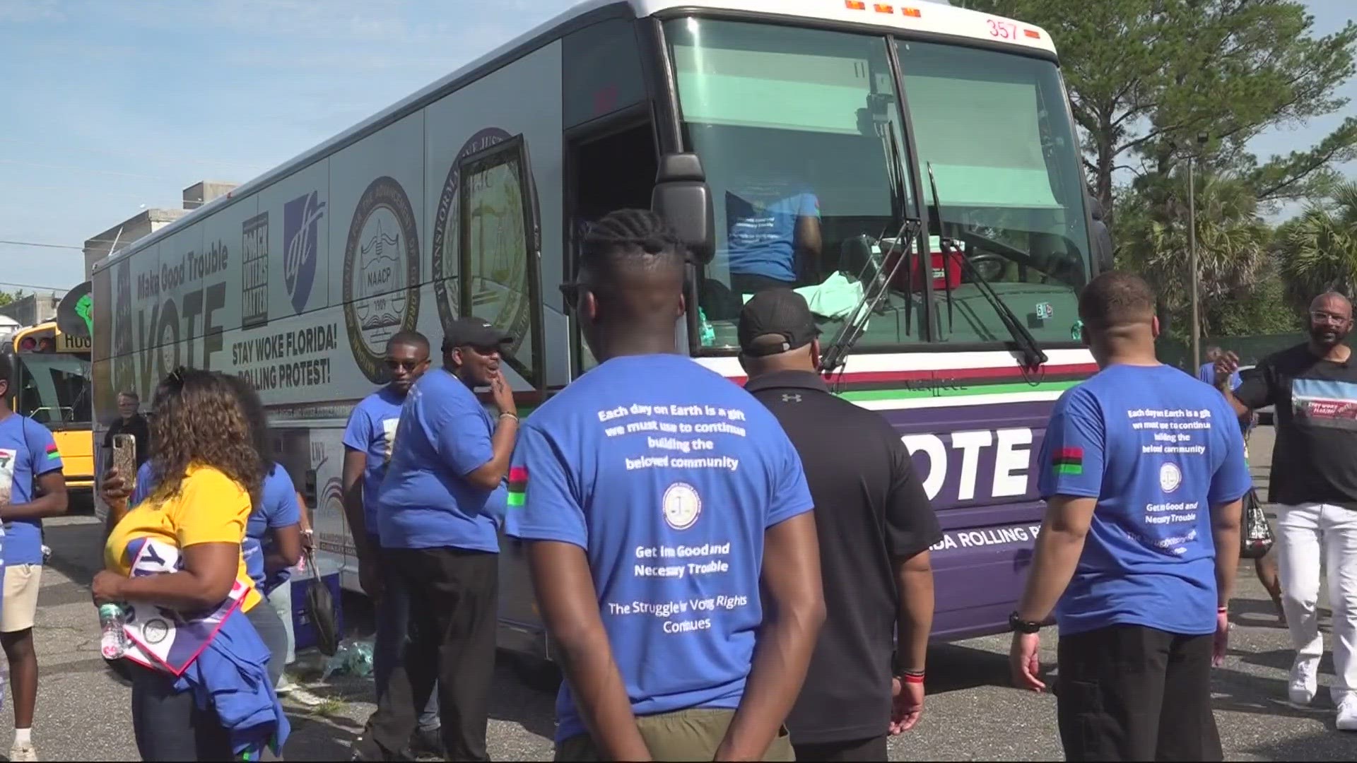 Nearly 30 members from the Transformative Justice Coalition loaded the ‘John Lewis make trouble good bus’ at the kickoff event.