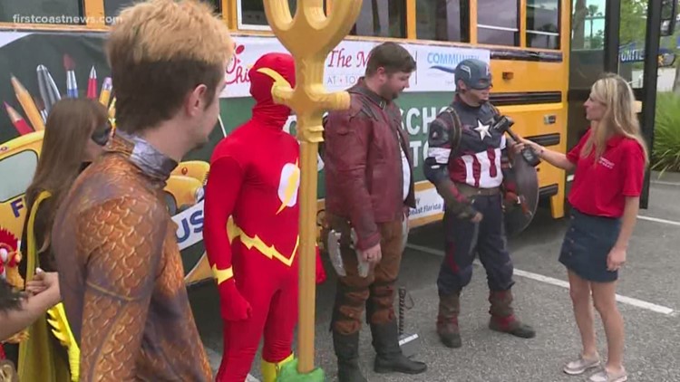 Superheroes help 'Stuff the Bus'