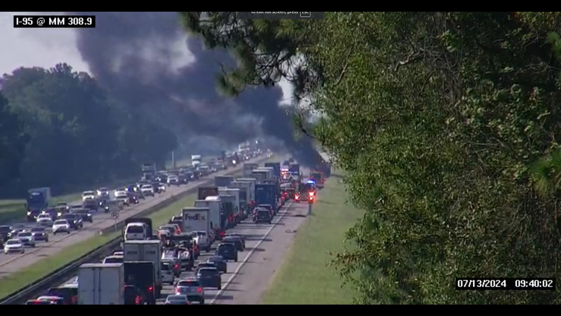 A vehicle fire was blocking two lanes of I-95 Saturday morning. Credit- Megan Russell