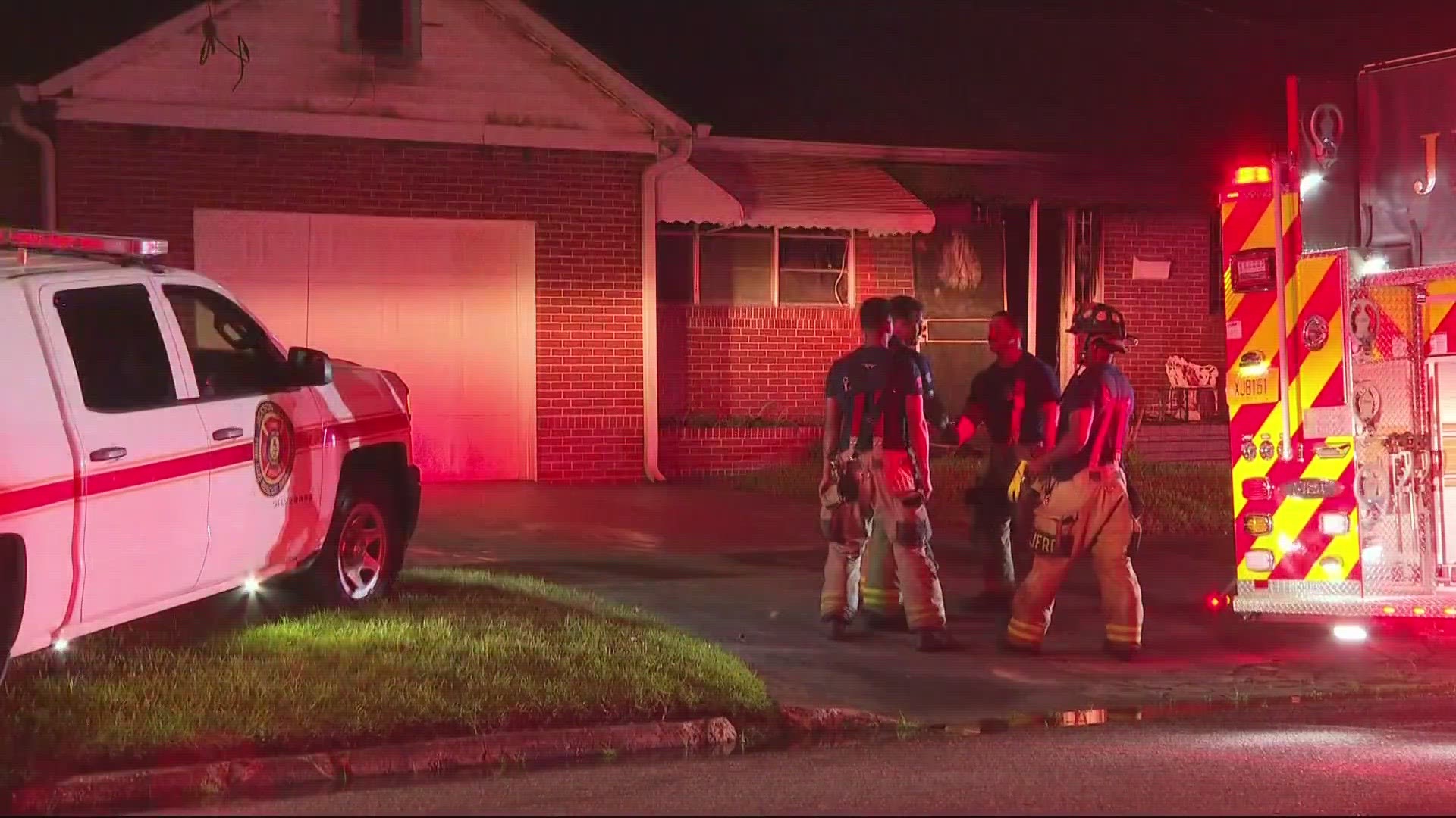 Officers say they found the woman in the kitchen of the home on Durkee Drive, where it appeared she was trying to escape.