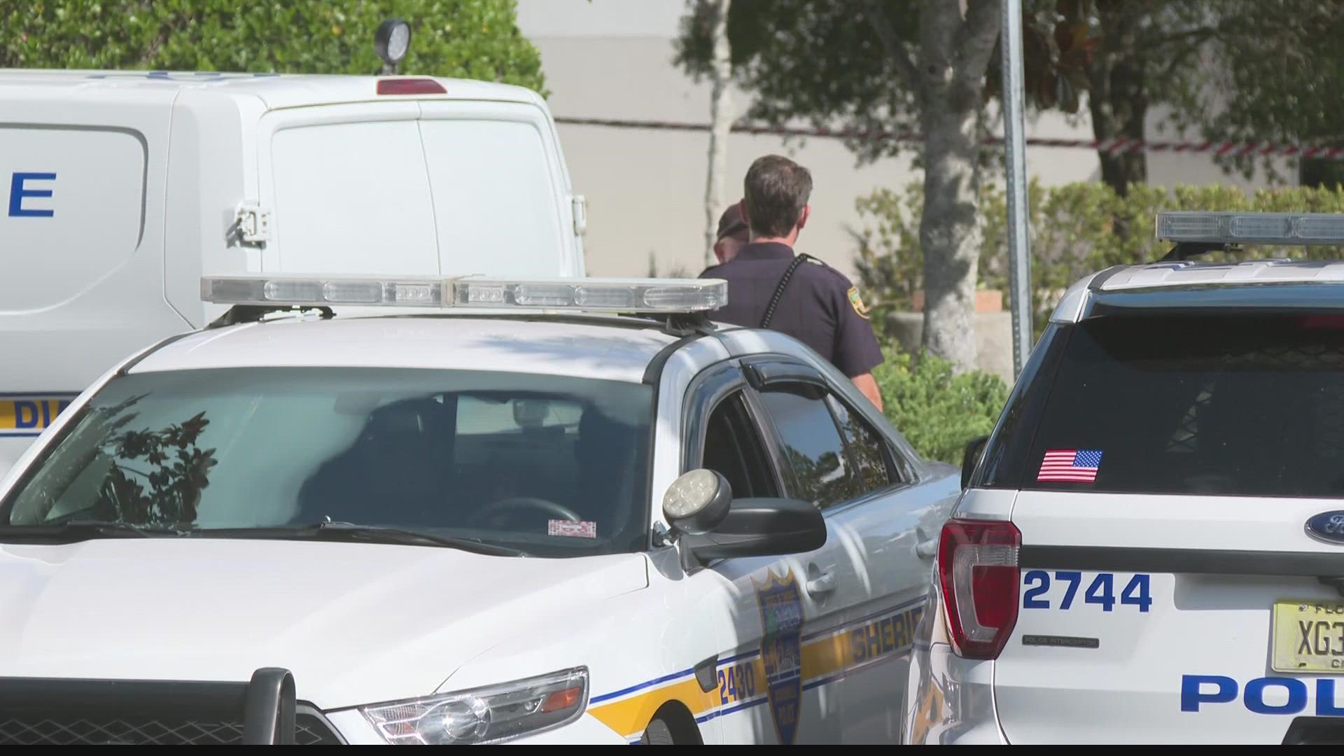 Police have detained two suspects. They were alerted by a panic alarm around 8:40 a.m. Two suspects entered the bank, showing a gun to a teller and demanding money.