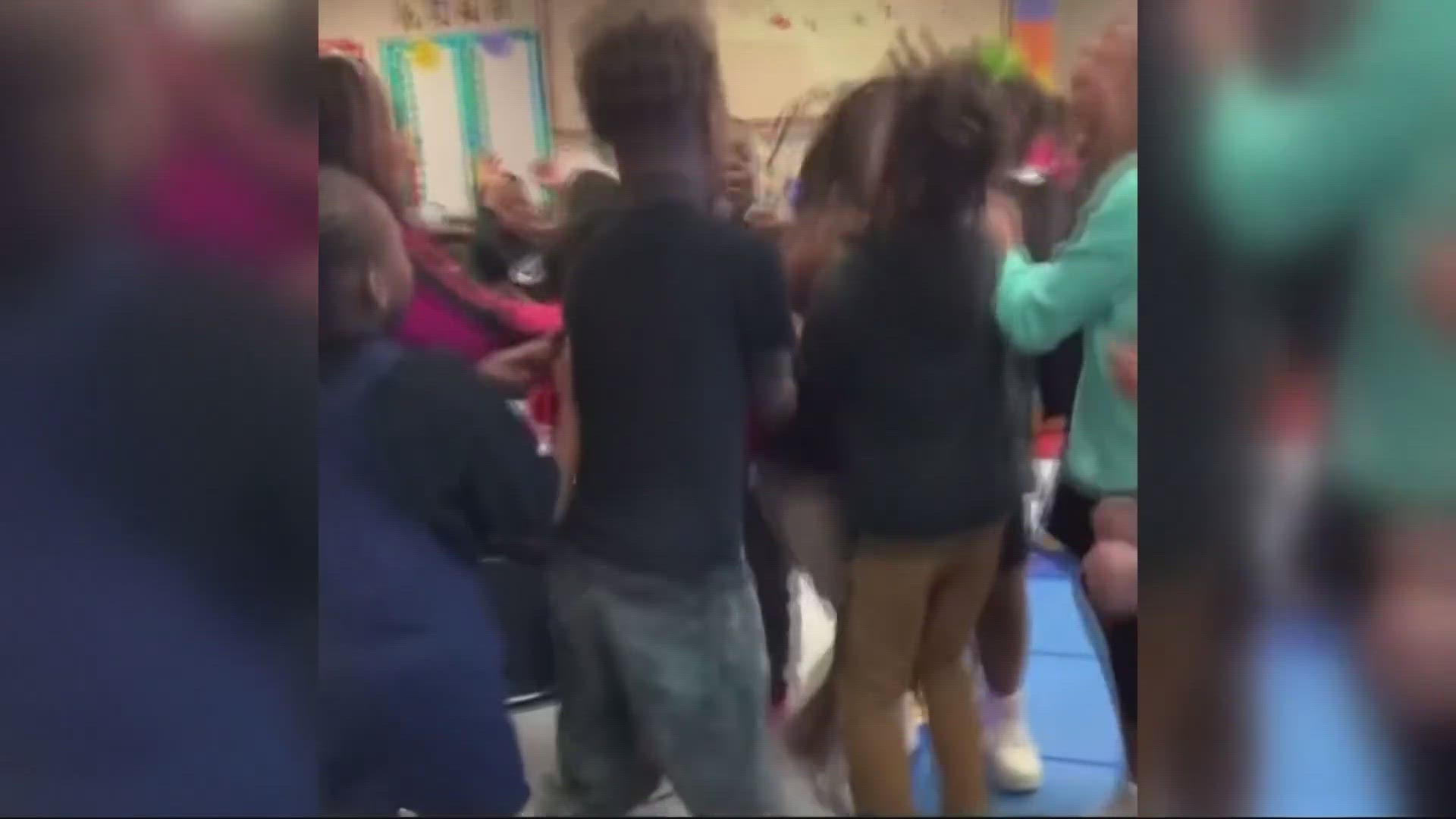 The cute video shows kiddos cheering for a student who answers a math question correctly, earning the whole class free time.