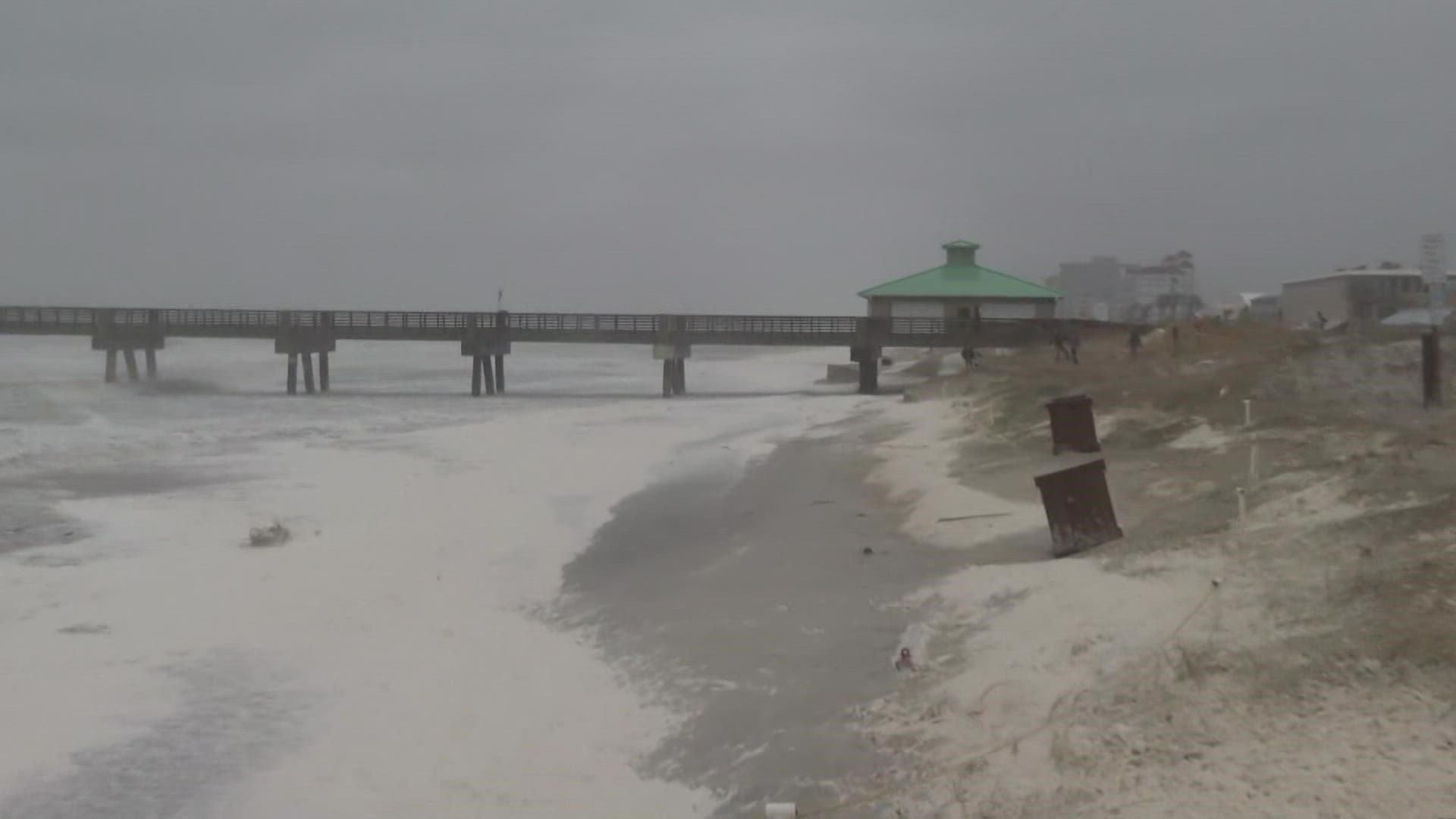 Water moves up onto the dunes on Jacksonville Beach September 29 2pm