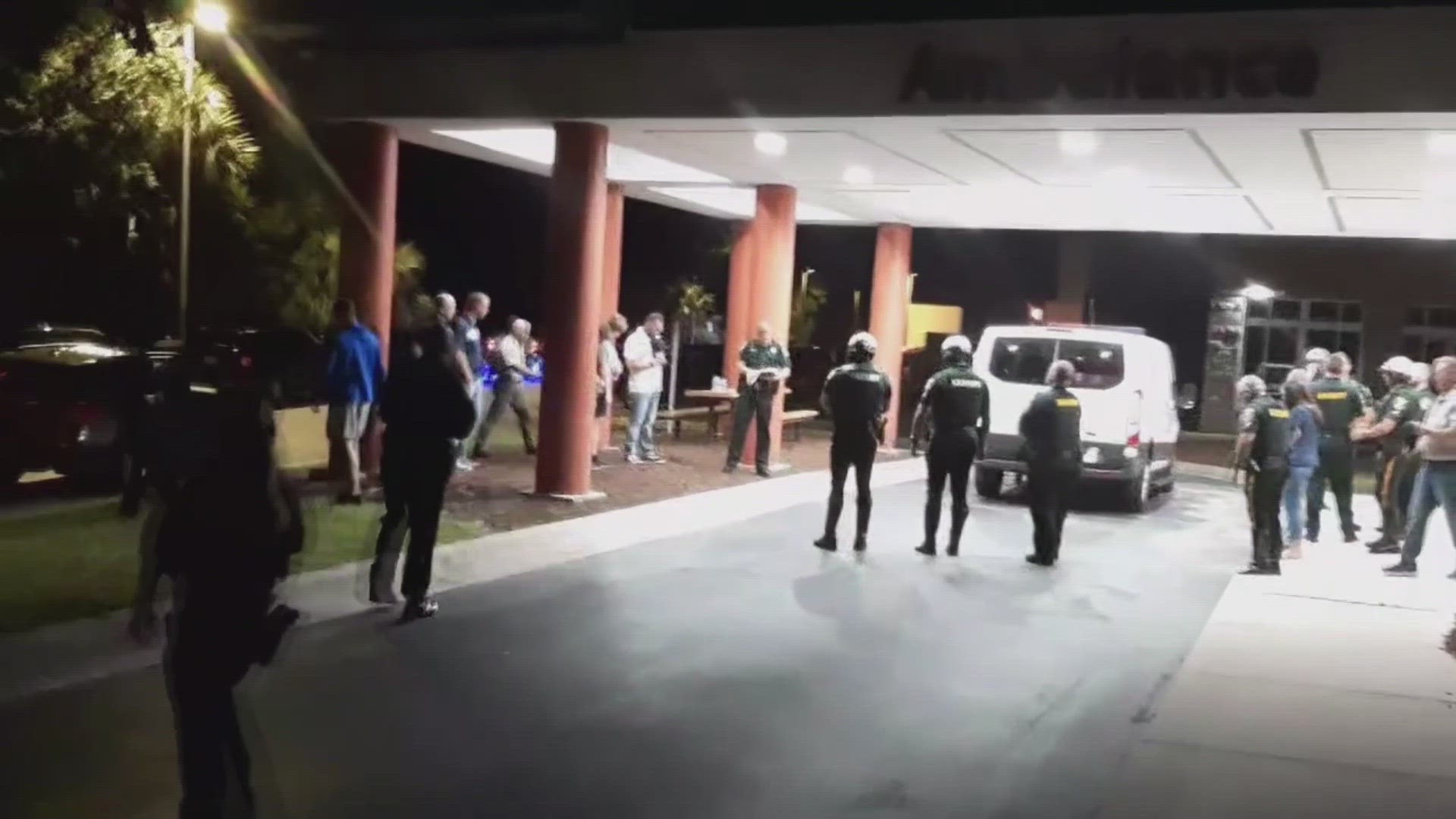 St. Johns Co. officers pray outside of hospital | firstcoastnews.com