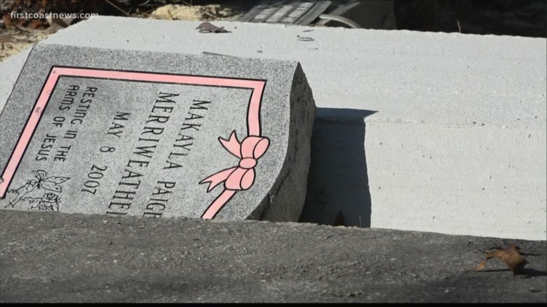 A cemetery in Middleburg was vandalized, leaving behind smashed gravestones and the remains of a child dragged out of her grave.