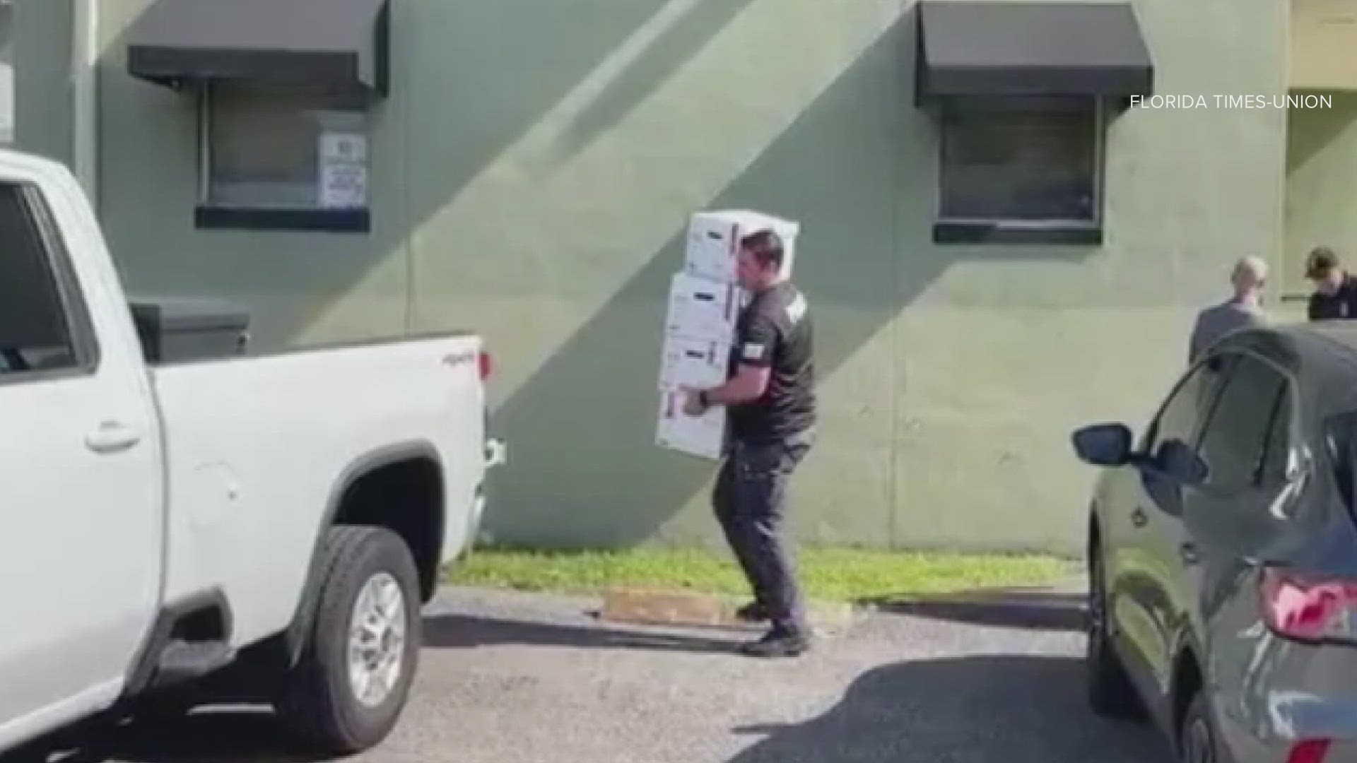 Florida Times-Union reporters witnessed FBI and IRS agents removing boxes from the building Wednesday.