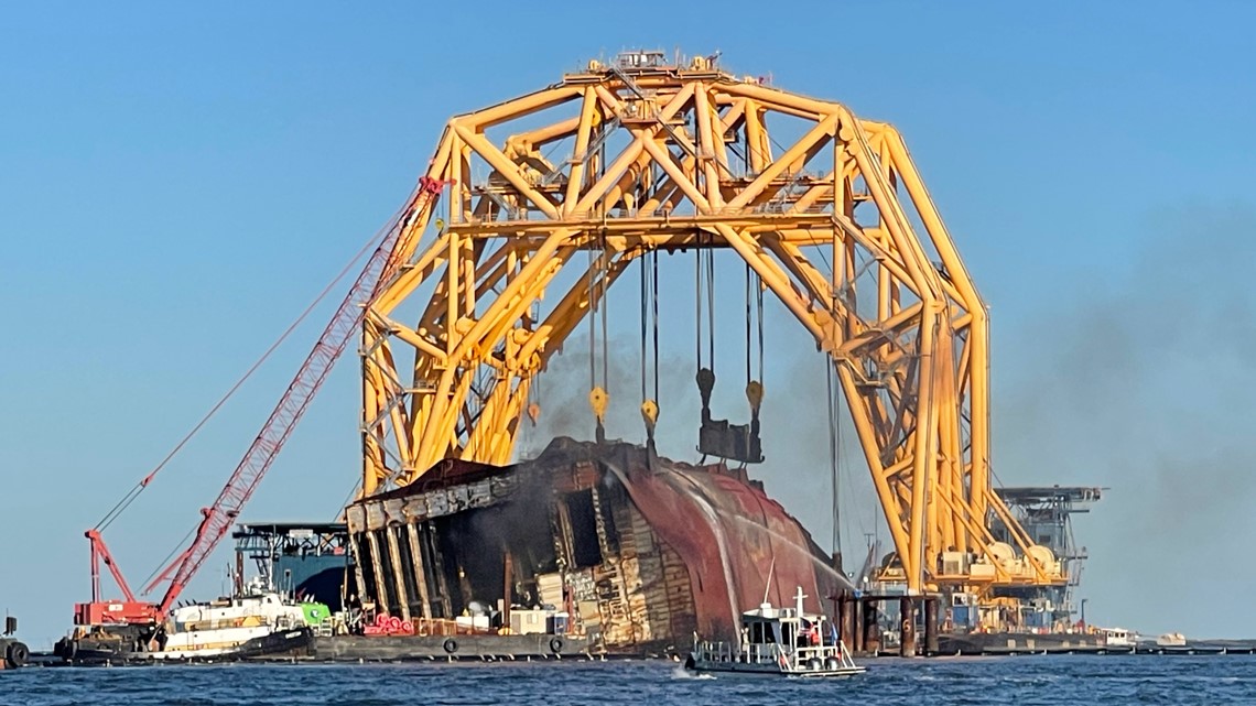 capsized cargo ship catches fire