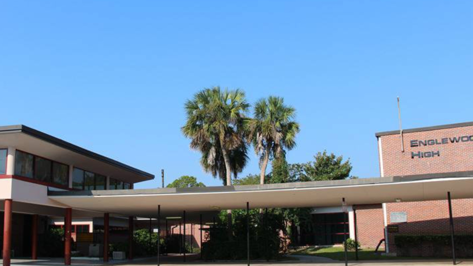 A weapons detective dog found multiple firearms stored in a car parked in the school parking lot Monday, school officials confirmed.