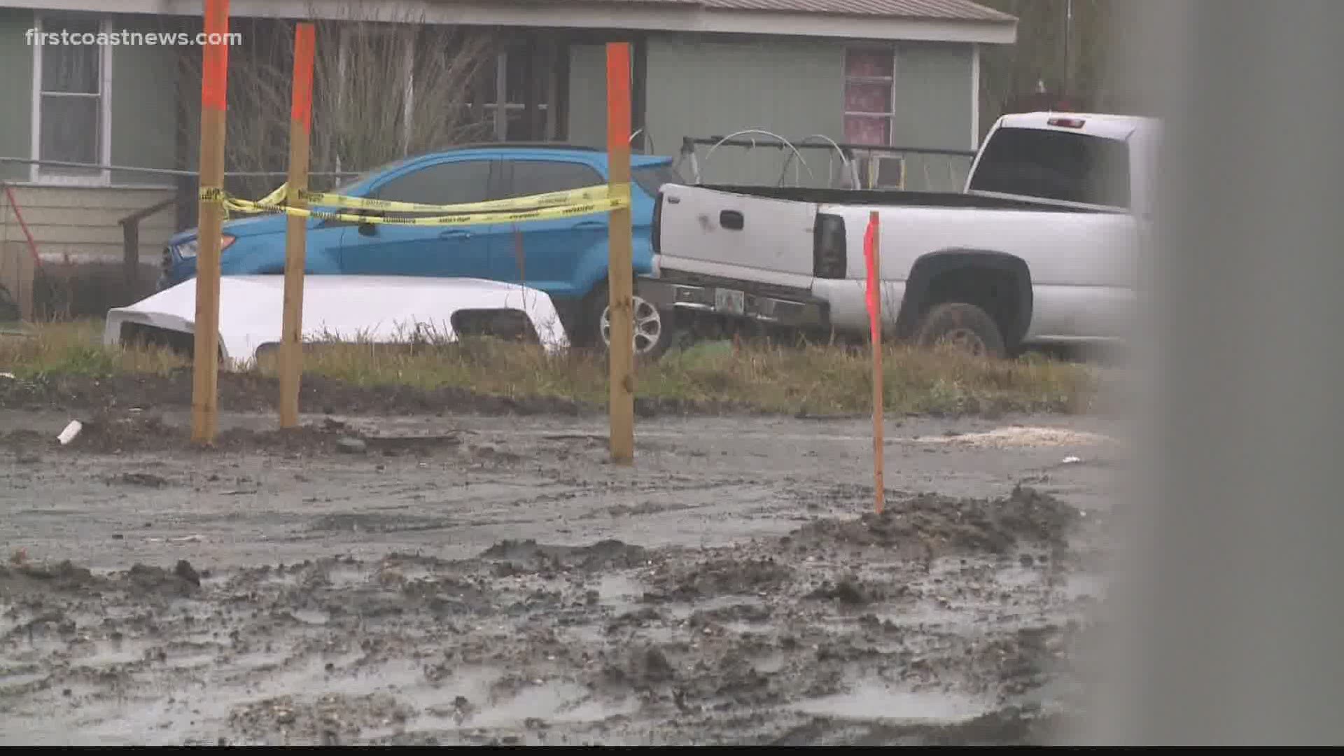 During a First Coast News live report, a woman got stuck on a road that was dug up to lay in sewer pipelines in the Biltmore neighborhood.