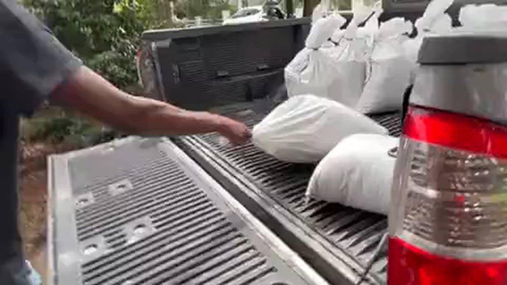 Ekcerd College students helped a River Road home in Jacksonville's San Marco area prepare for Hurricane Helene with sandbags.
Credit: Renata Di Gregorio