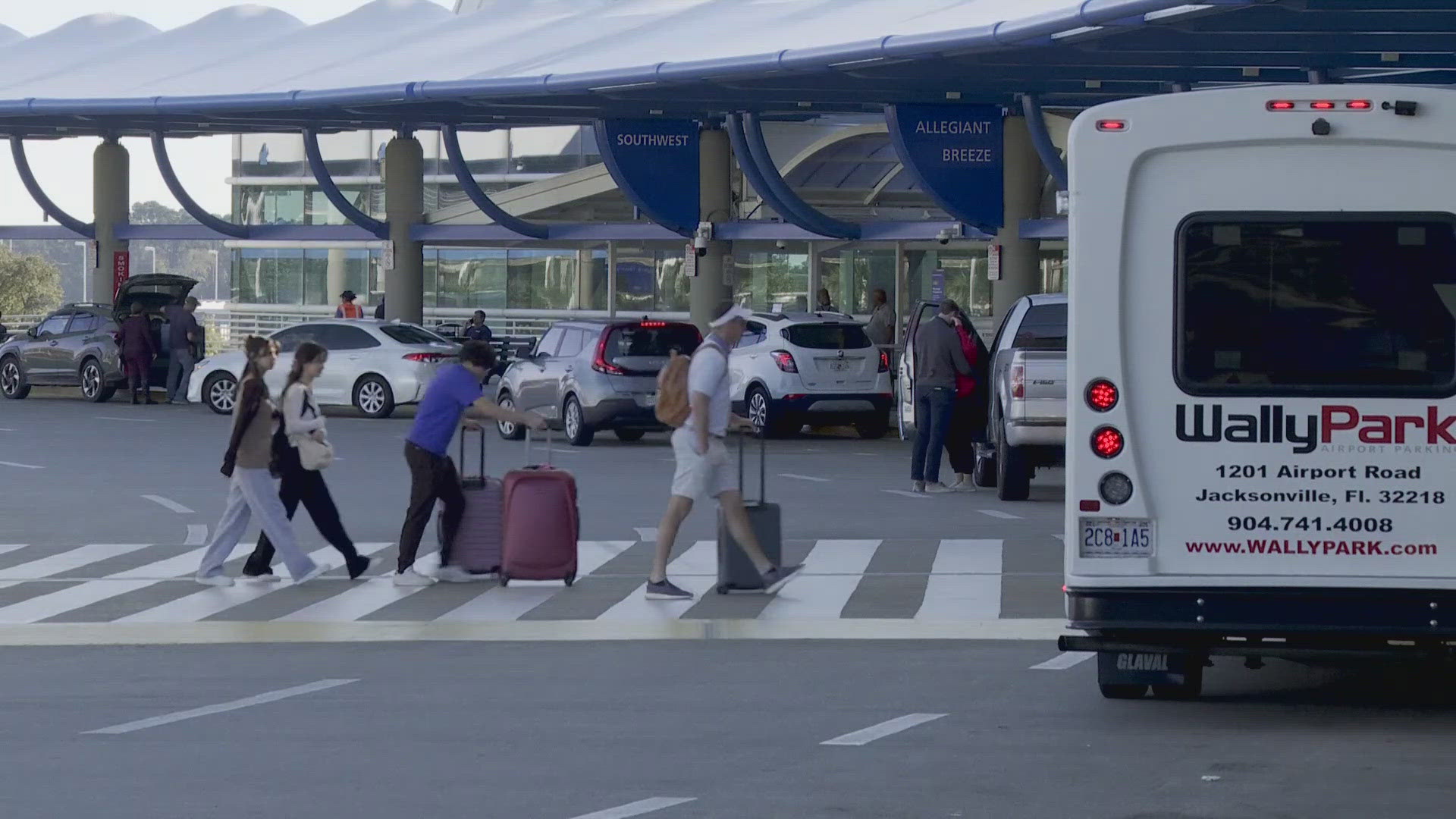 Officials say 13,300 passengers were expected to fly out of JAX on Tuesday.