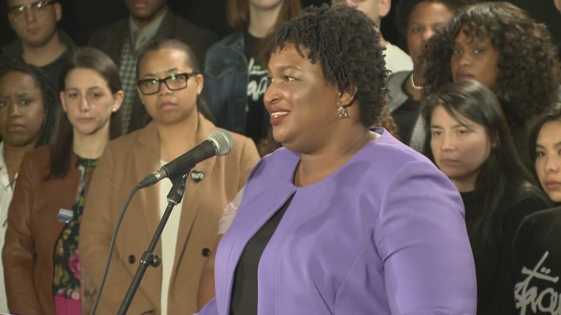 Democrat Stacey Abrams says she can't win Georgia governor race, effectively ending her challenge to Republican Brian Kemp.