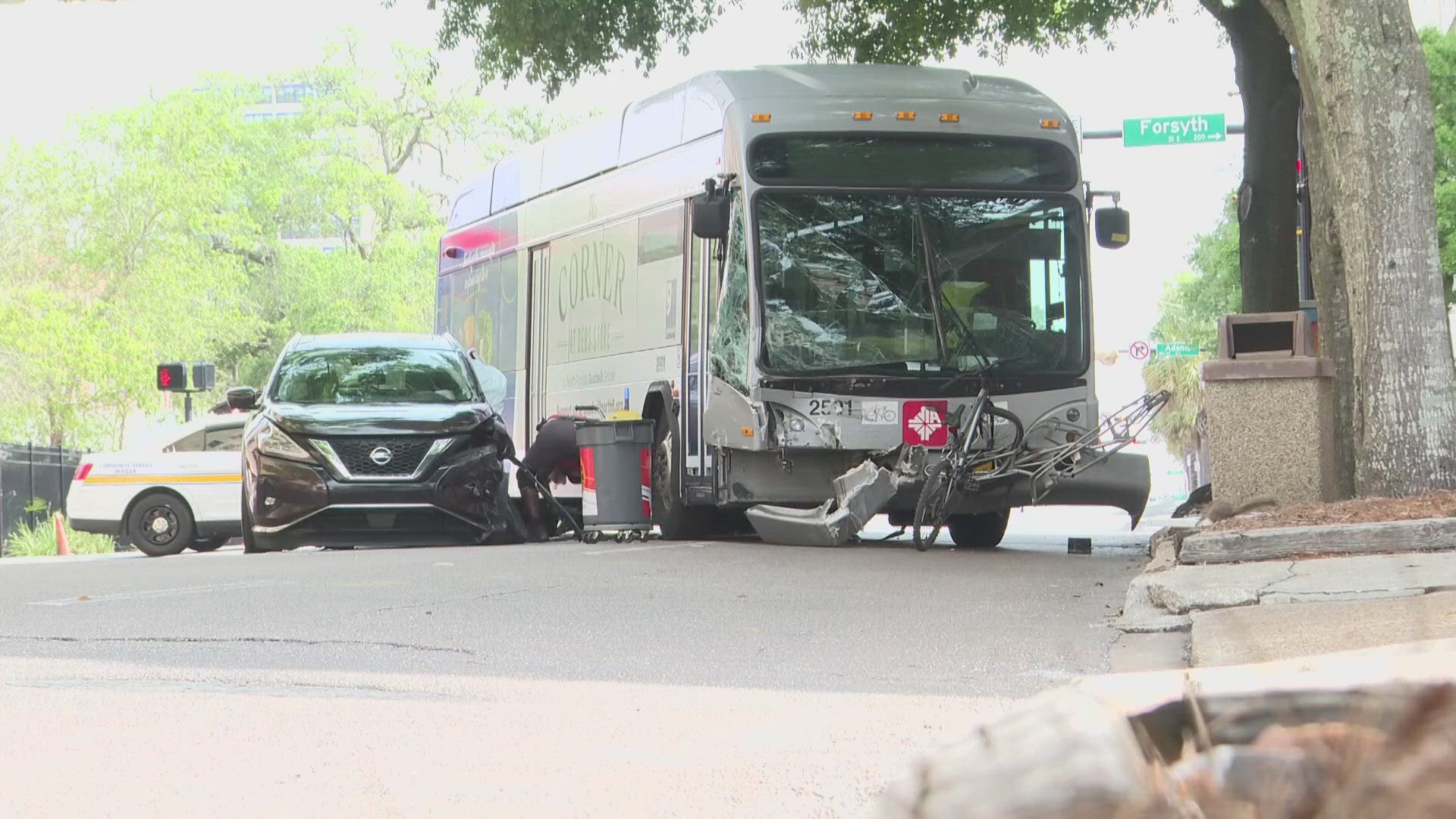 A First Coast News crew at the scene saw a Nissan with its front tires deflated and a JTA bus with its front and side window shattered.