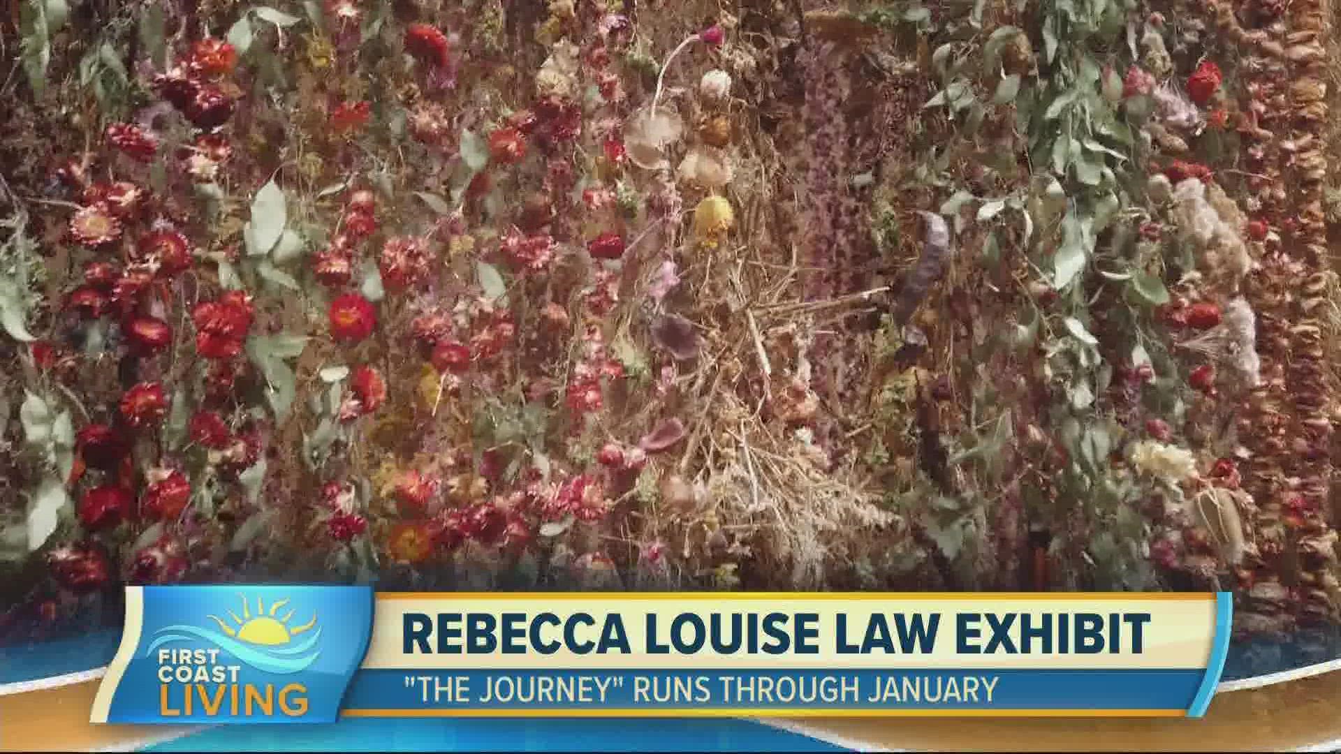 Rebecca Louise Law shows off the beauty of nature with a 16 foot wall of flowers that makes a tunnel. The Journey runs through January.