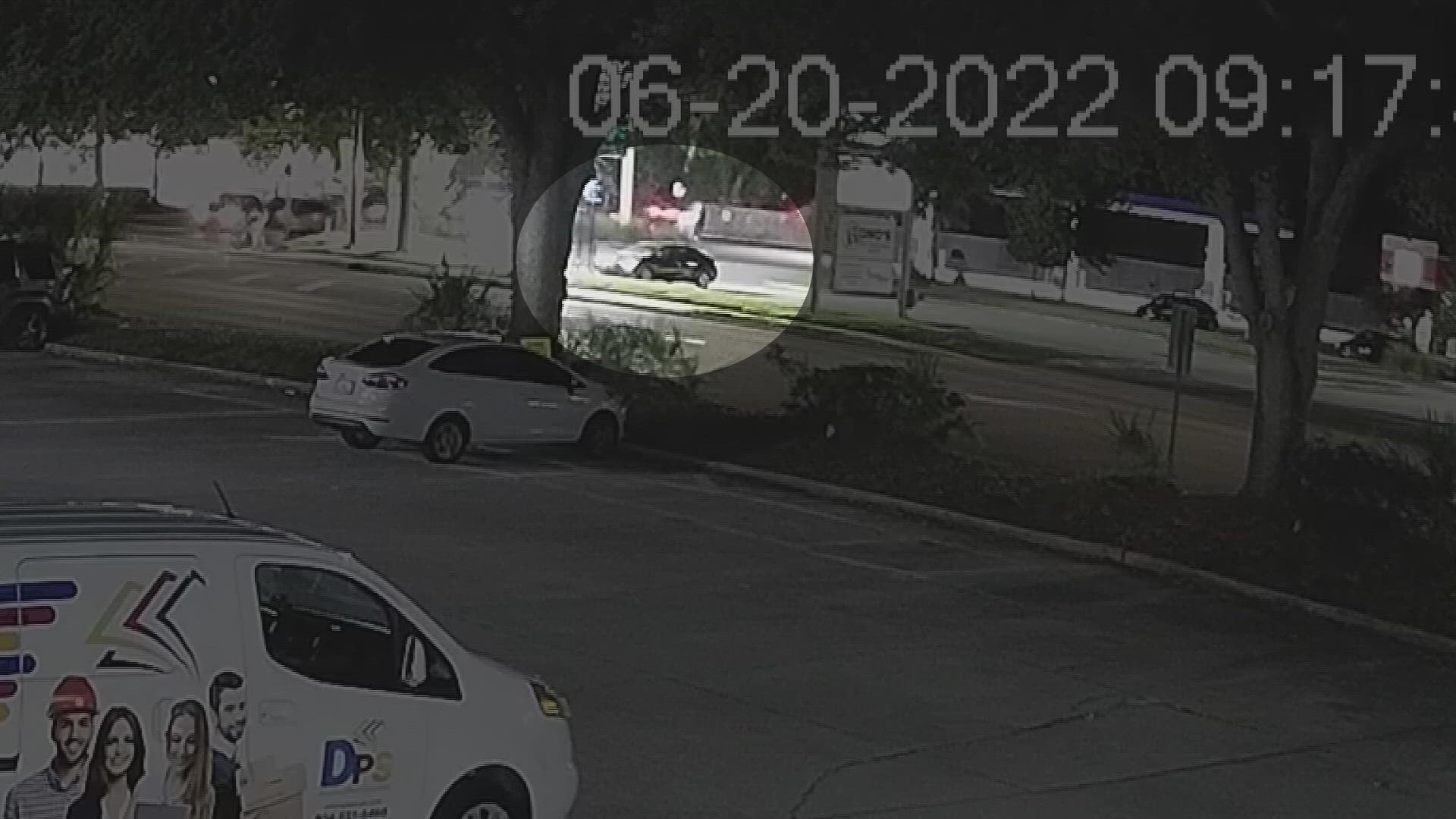 The footage shows a man get into the car, enter the car, run away and then run back again, entering the car before running away a second time.