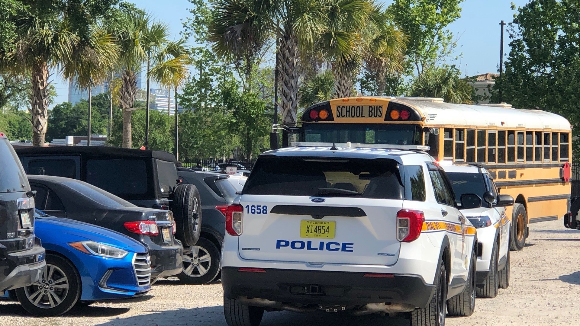 The officer at the scene says someone started shooting in the area and the school bus was hit.