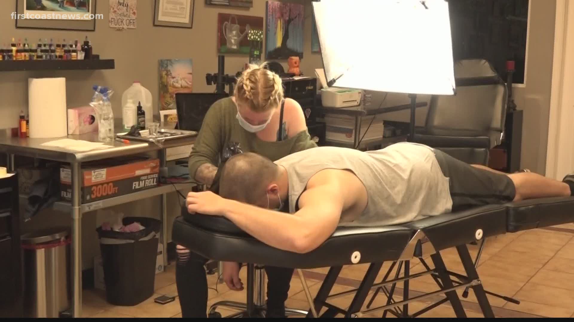 A tattoo parlor in Georgia is among many non-essential businesses reopening in the state amid COVID-19.
