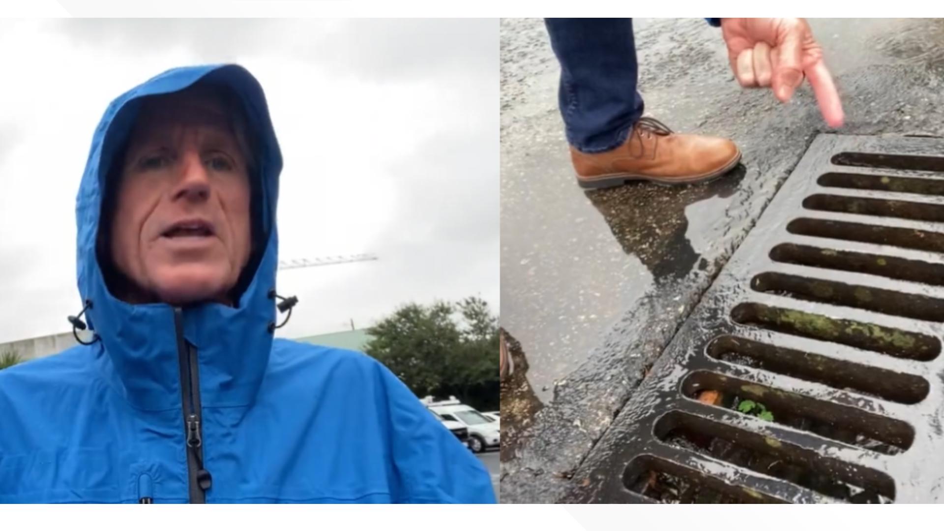 Chief Meteorologist Tim Deegan explains to Meteorologist Makayla Lucero why he watches the storm drains to help gage flooding risks as Hurricane Ian approaches.