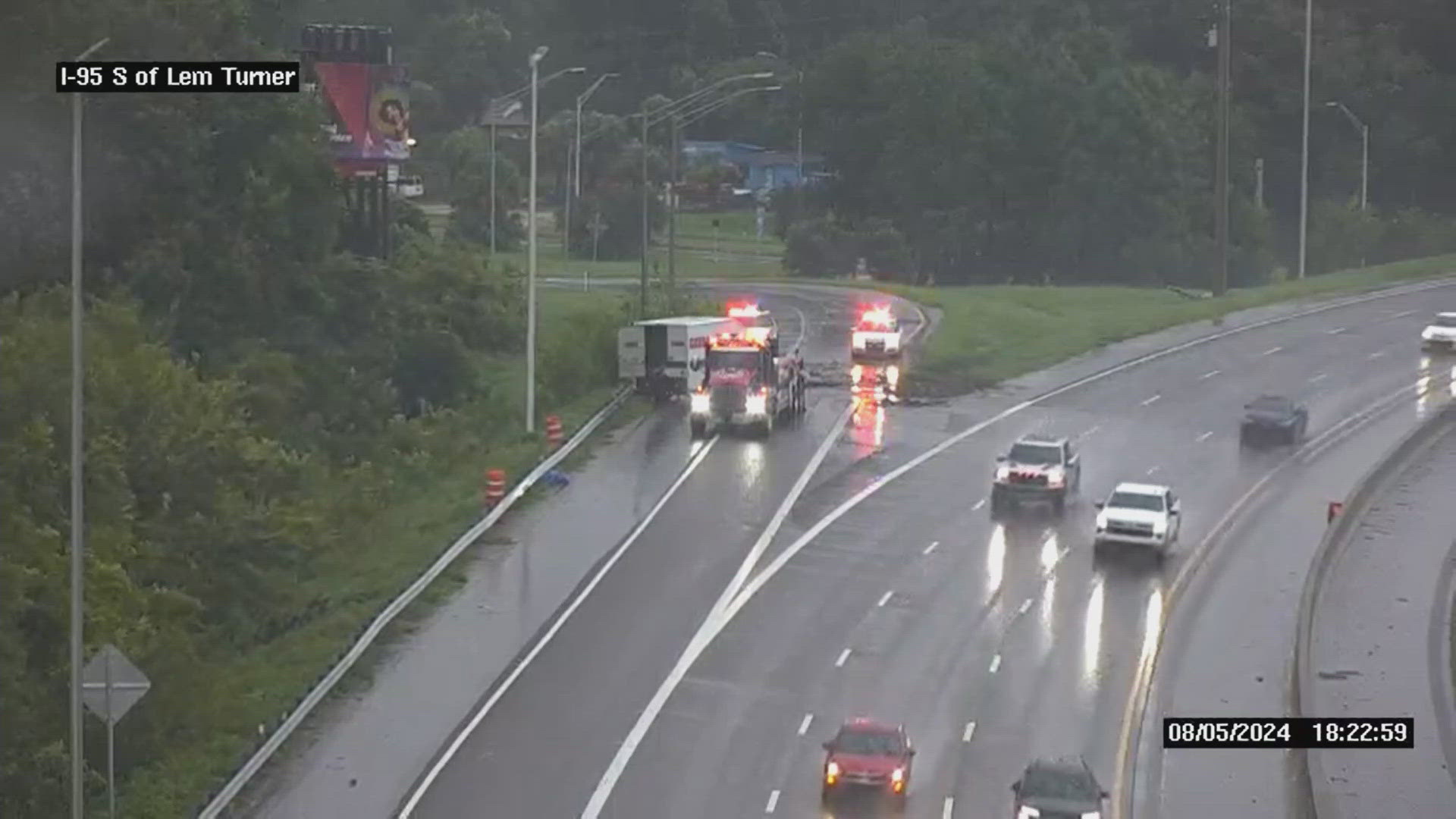 Overturned armored vehicle blocks on-ramp of highway during Tropical Storm Debby (via Florida 511)