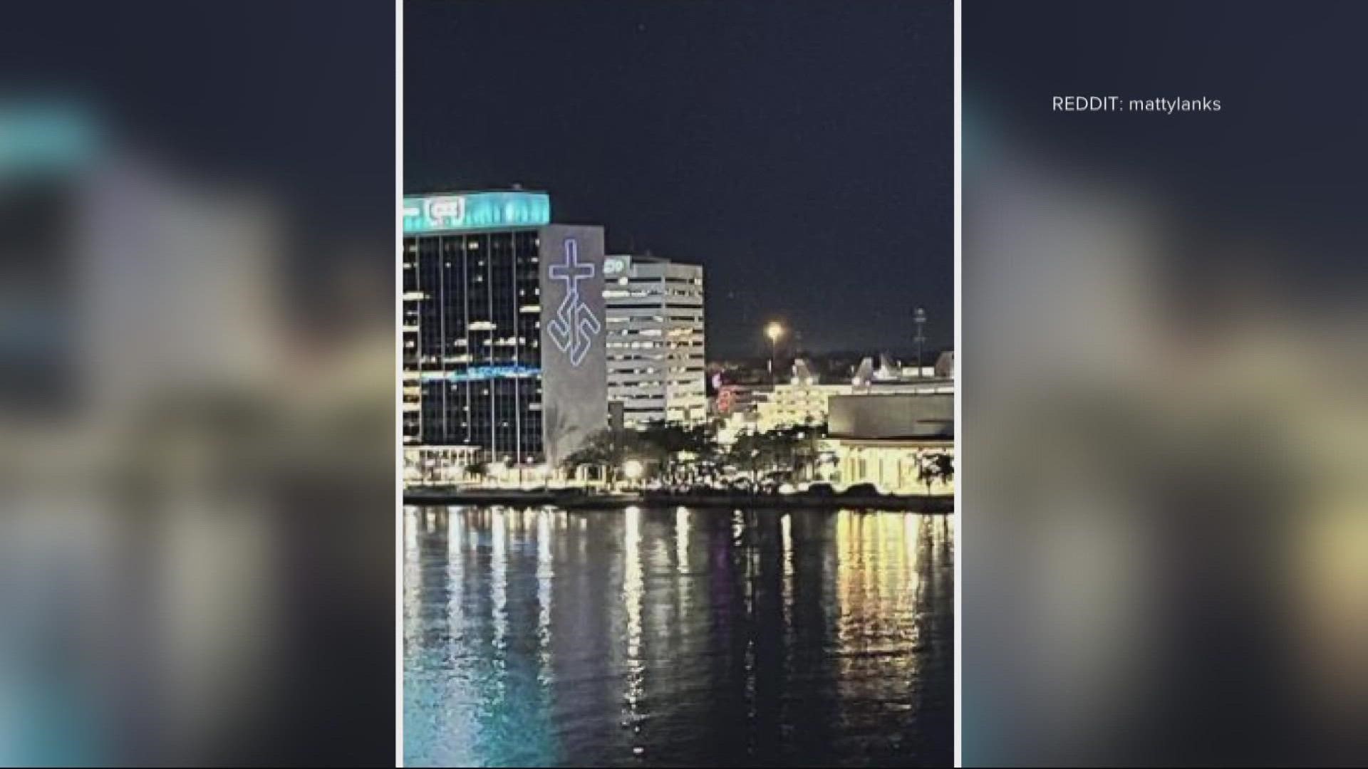 A photo circulating on social media shows a swastika projected onto the CSX building in Downtown Jacksonville.
