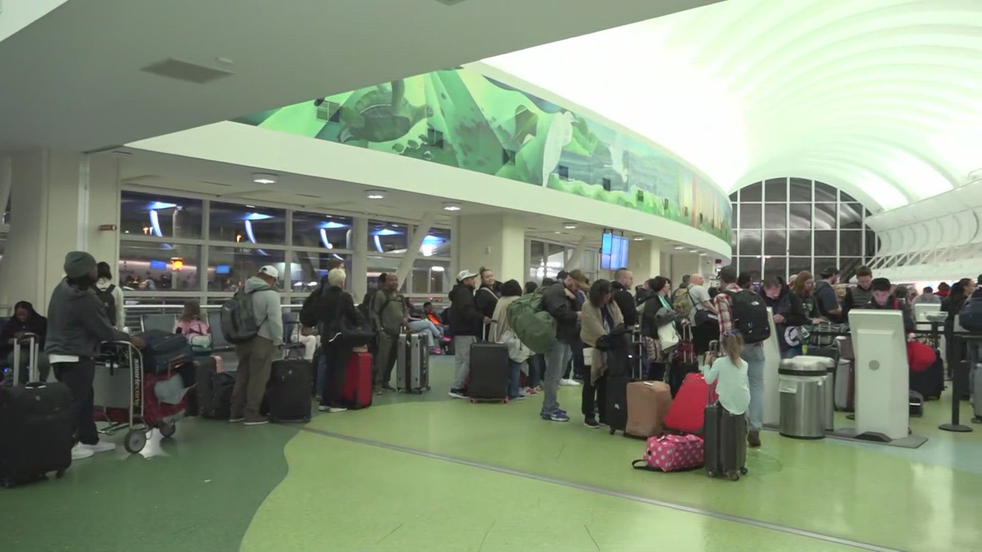 Several airlines had long lines Friday morning at JIA. Passengers First Coast News spoke with say arriving early for your flight is a good idea.