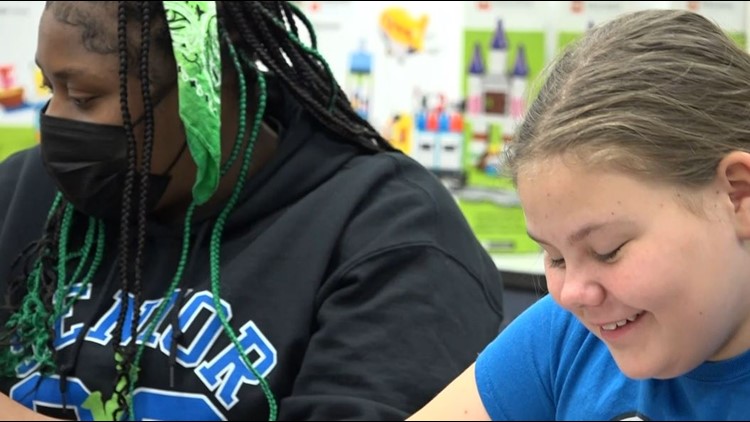 Fifth graders meeting new challenges thanks to several high school students