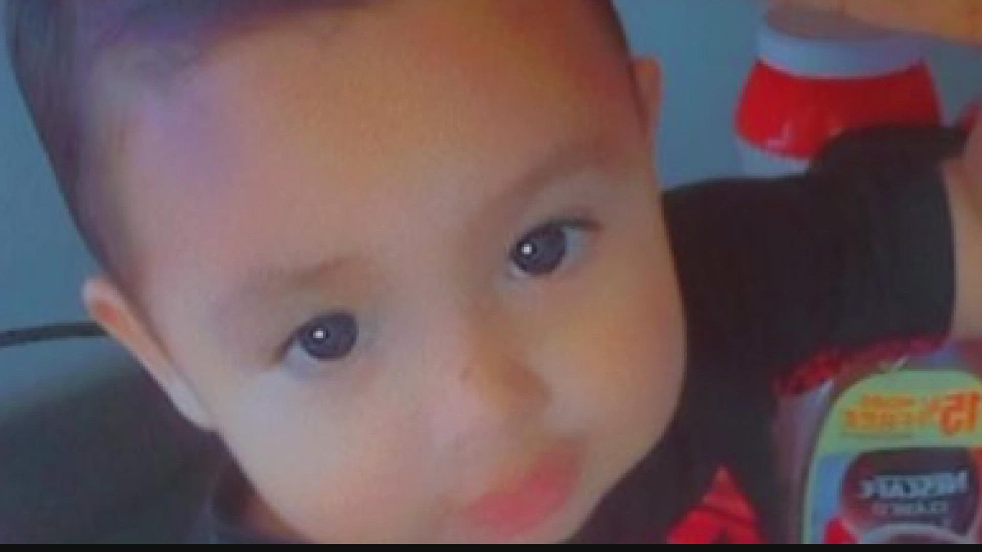 The toddler's body was found in a septic tank near his Crescent City home after almost 24 hours of searching.