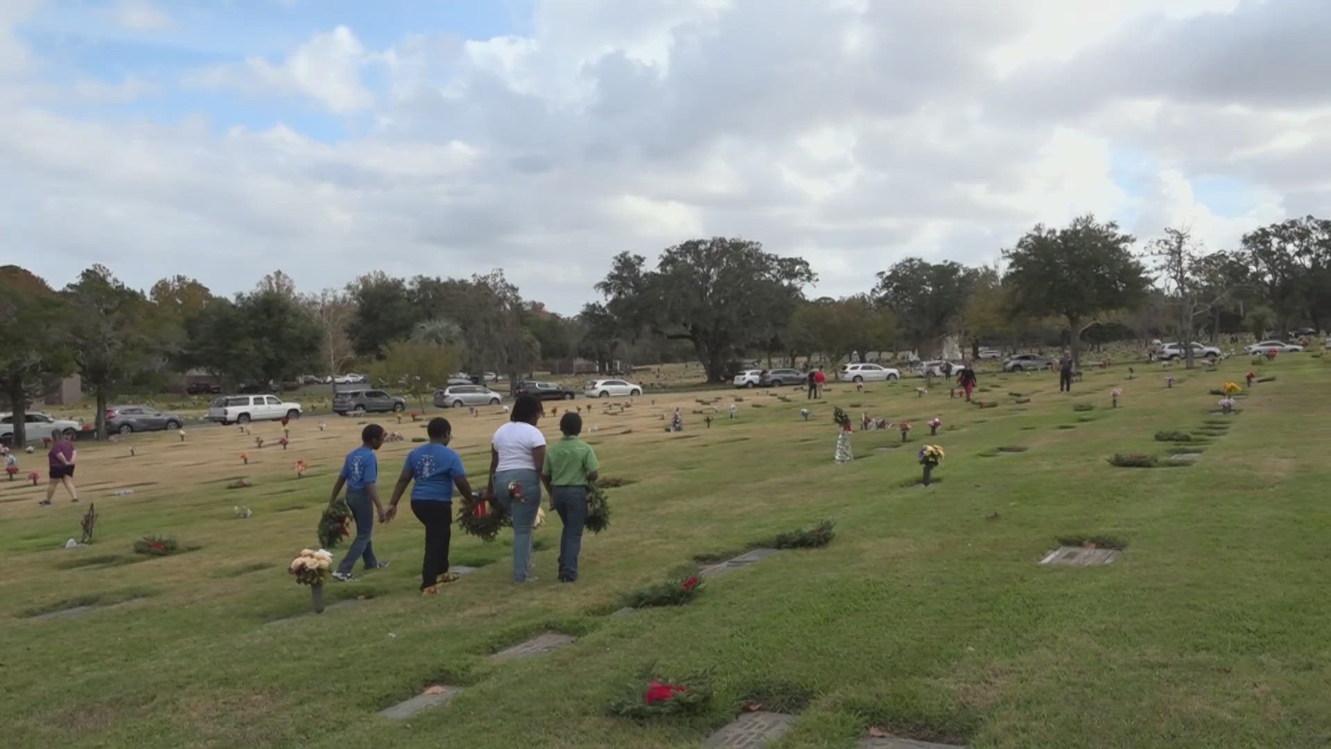 On Saturday, volunteers at the Jacksonville Memory Gardens placed wreaths on the graves of at least 3,500 veterans.