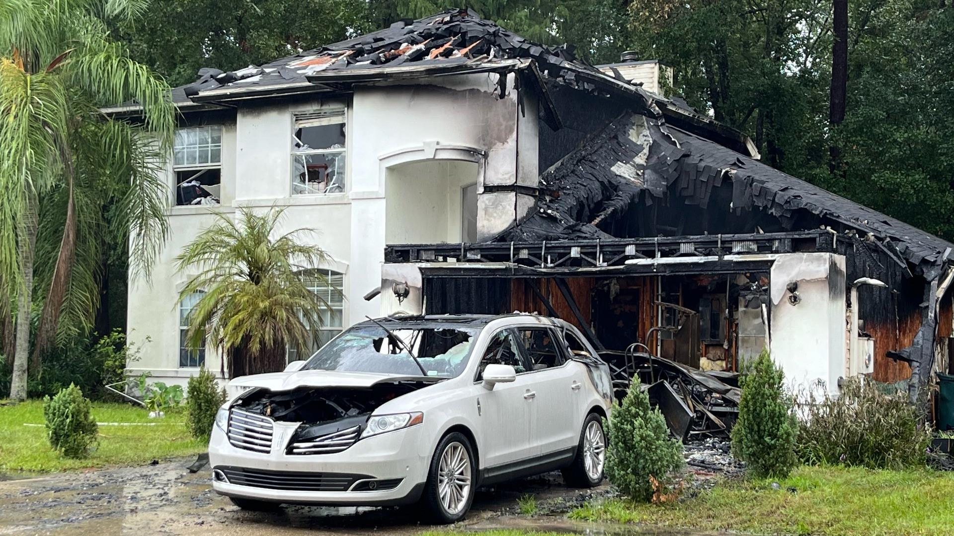 The Jacksonville Fire and Rescue Department says lightning struck a home on Alexis Forest Drive Wednesday morning, causing it to be engulfed in flames.
Credit: Joe Massa