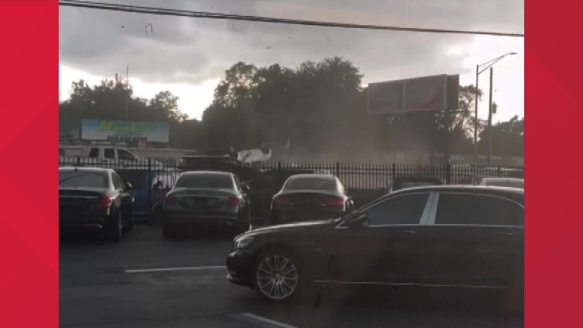 This video submitted by Driveline LLC, a car dealership on Beach Boulevard in Jacksonville, Florida shows a car picked up by the wind and flipped over.