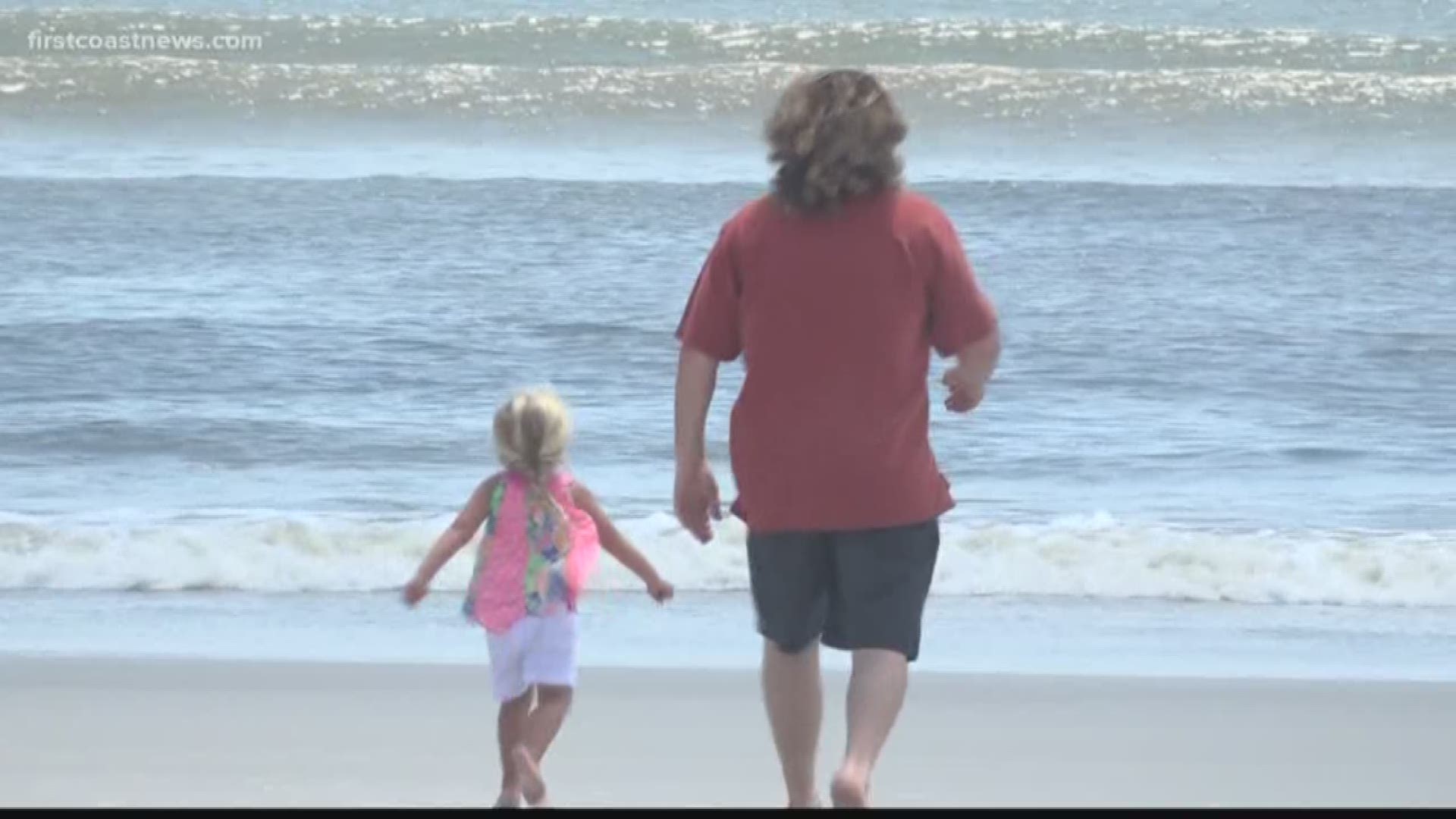 An Atlantic Beach man is looking for the surfers he says saved his and his granddaughter?s lives by pulling them from a riptide.