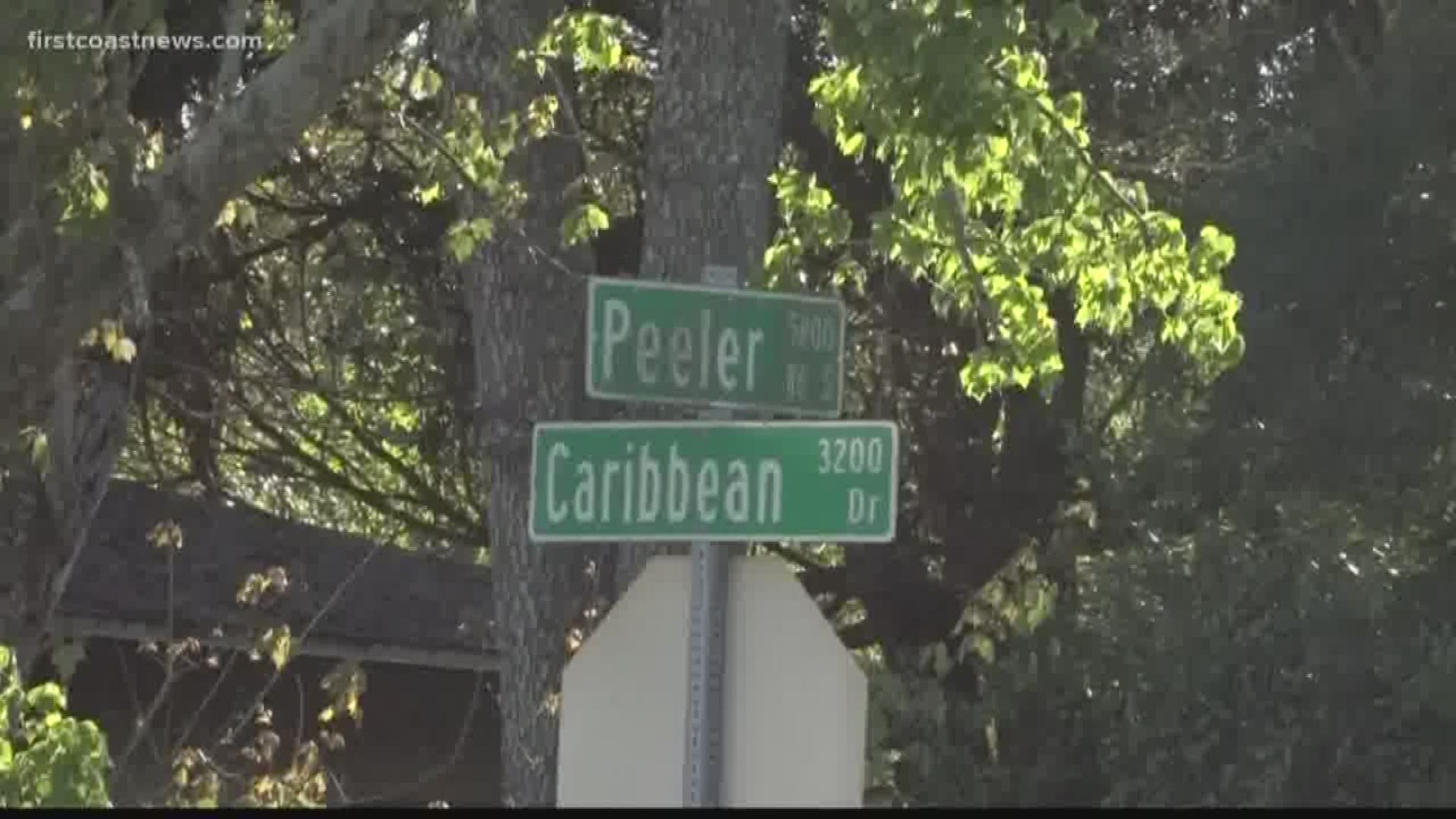 Police say the man was burglarizing his ex-wife's home and fired shots inside, then barricaded himself in.