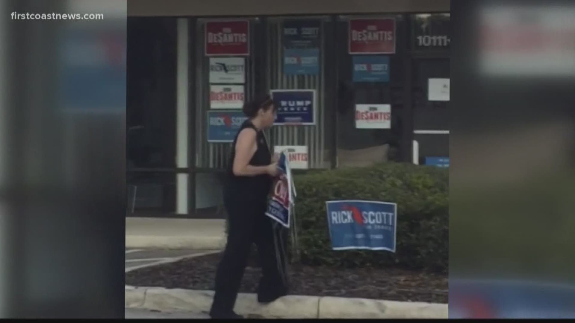 A woman was caught allegedly stealing campaign outside of the GOP headquarters in Jacksonville.