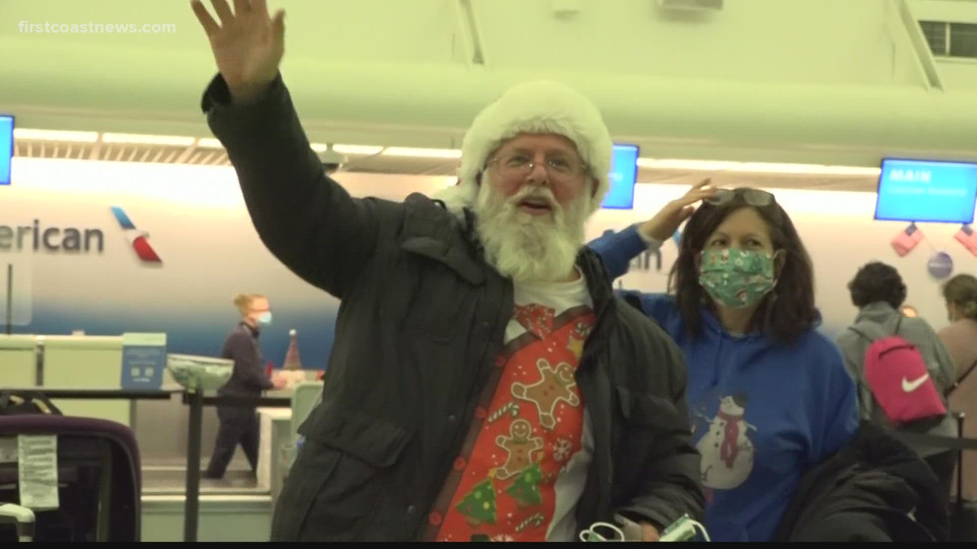 Hundreds of flights have been cancelled around the country on Christmas Eve. In Jacksonville, we found Santa and the Grinch in good spirits despite the chaos.