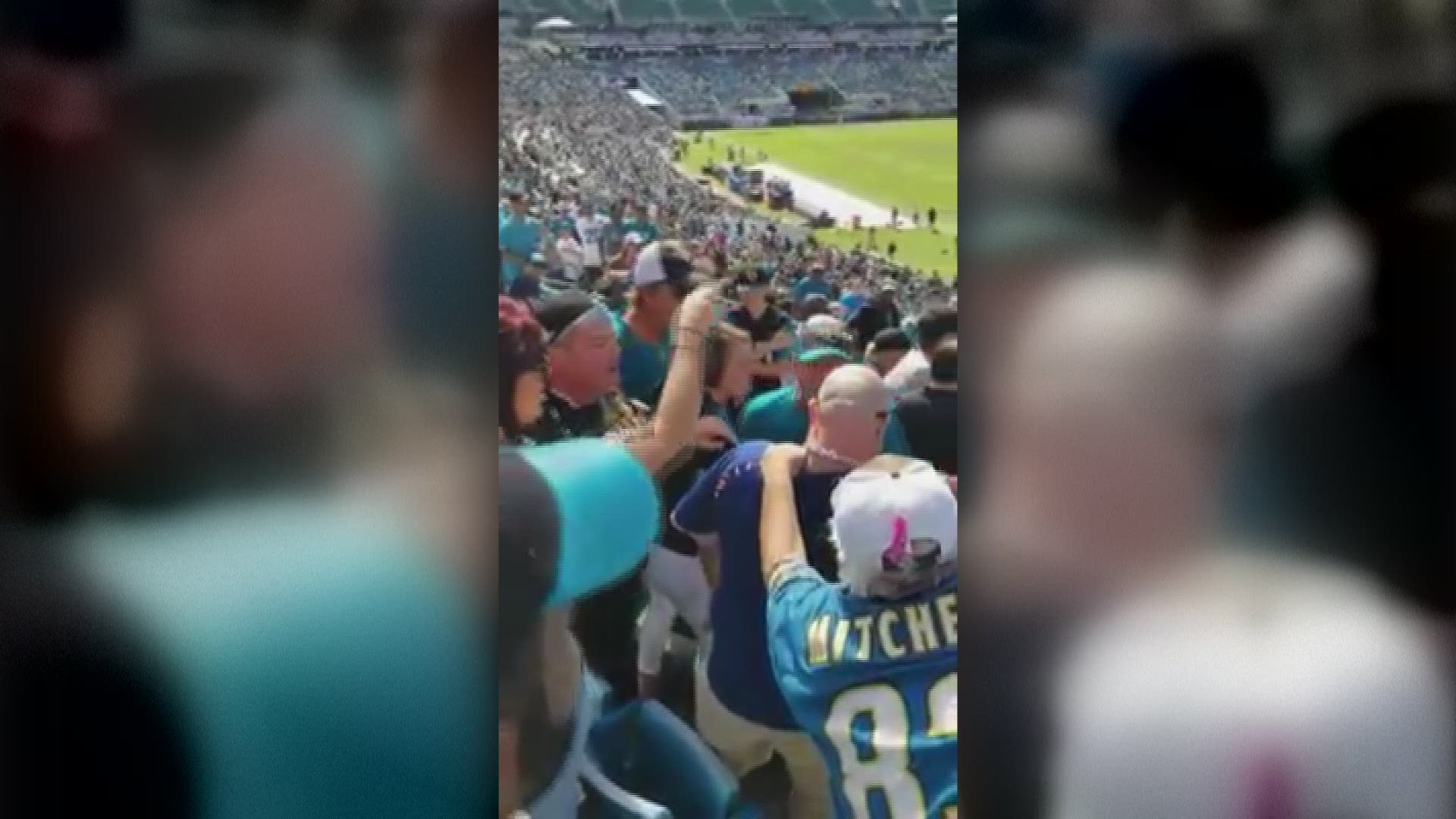A Jags fan can be seen sucker punching a Texans fan during the game. Video courtesy of Richard Elliott.