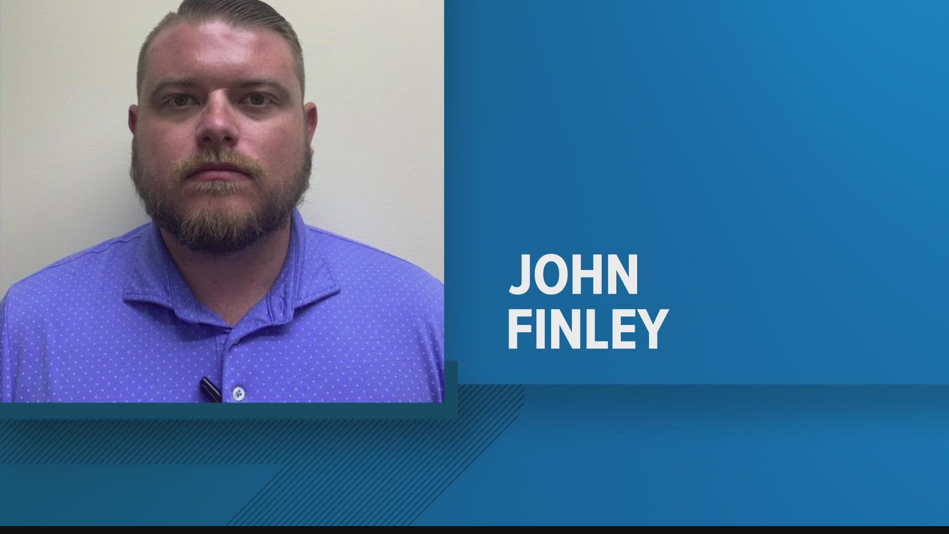Charges for John Finley Jr., 33, included sexual battery. Deputies said a woman accused the officer of "date rape." His bond was reduced to just over $100,000.