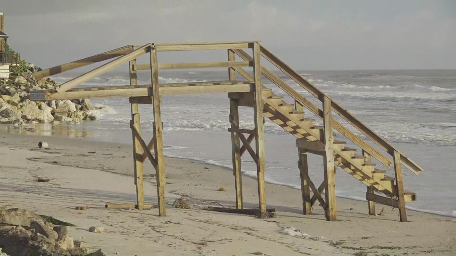 A walkway to the beach has since been destroyed.