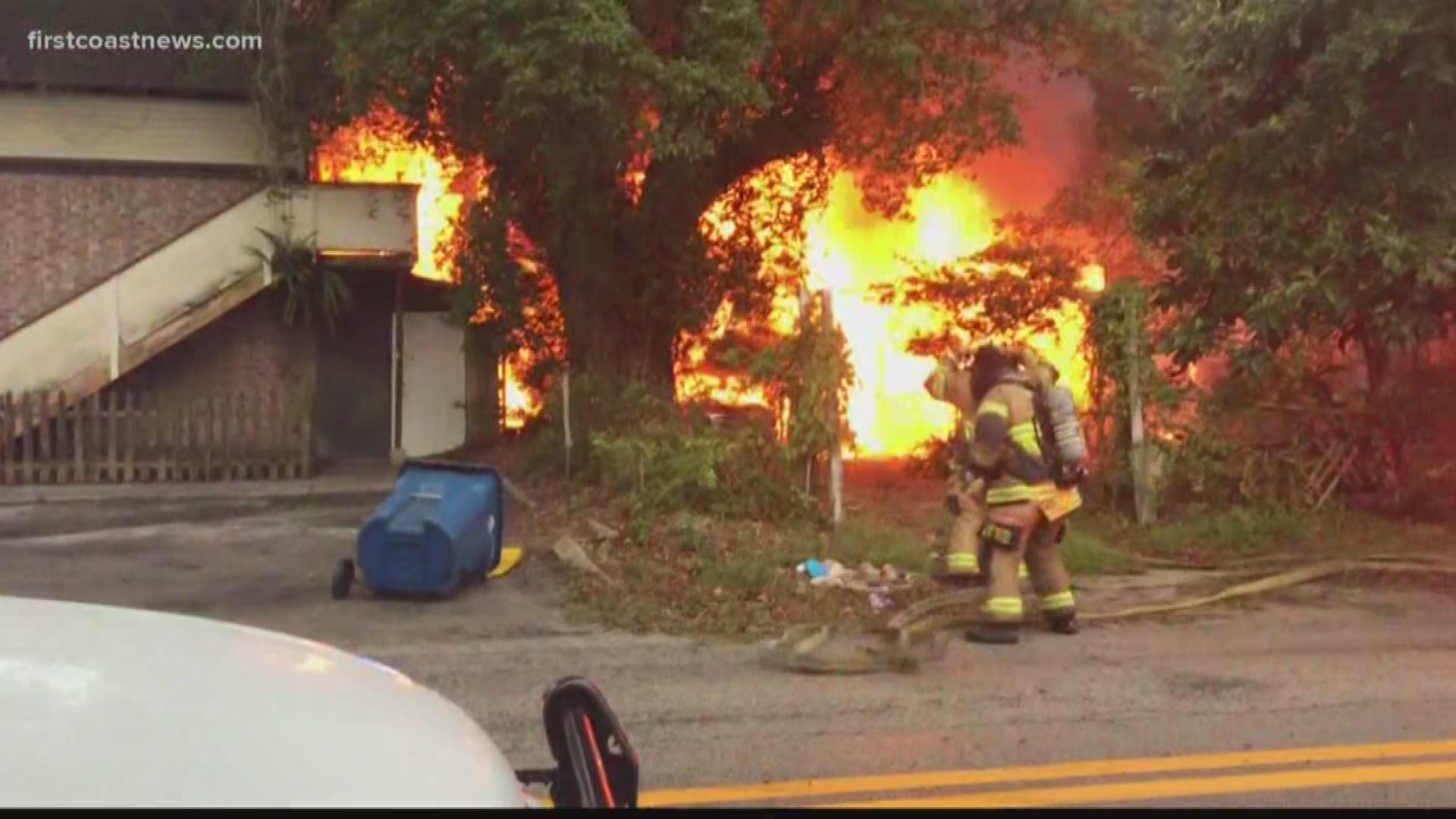 A neighbor says a homeless man started the fire because he was tired of looking at it empty.